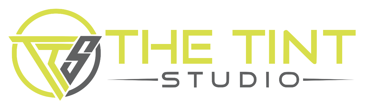 The logo for the tint studio is yellow and black.