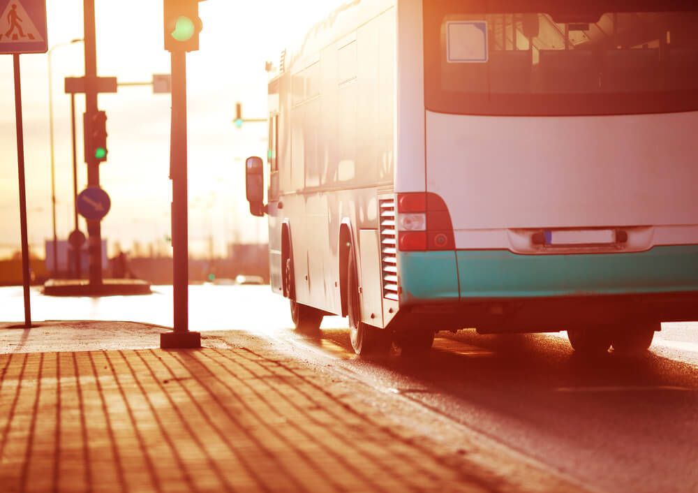 Bus Moving On The Road — Local Bus Hire in Byron Bay, NSW