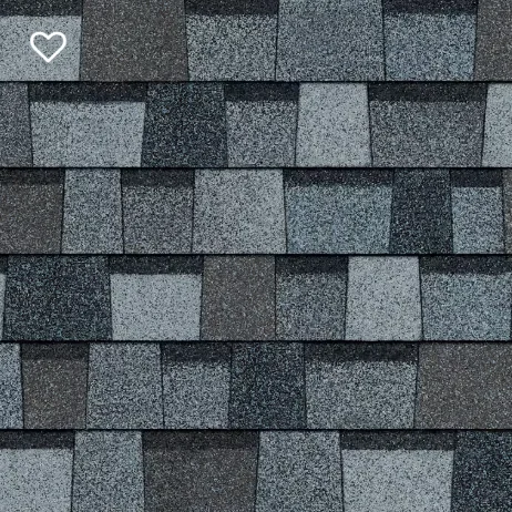 Close-up of asphalt shingles in shades of gray and blue.