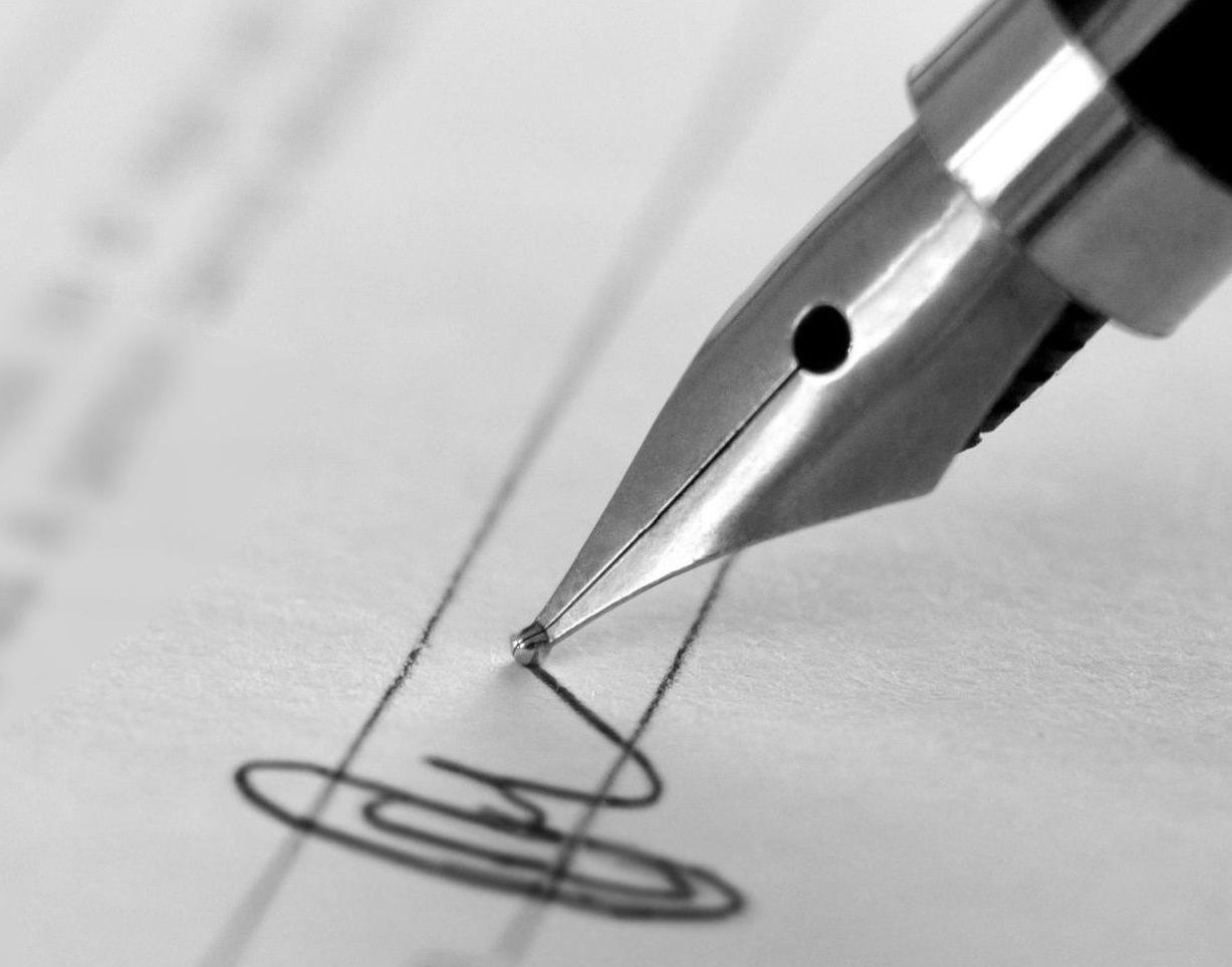Pen signing a contract
