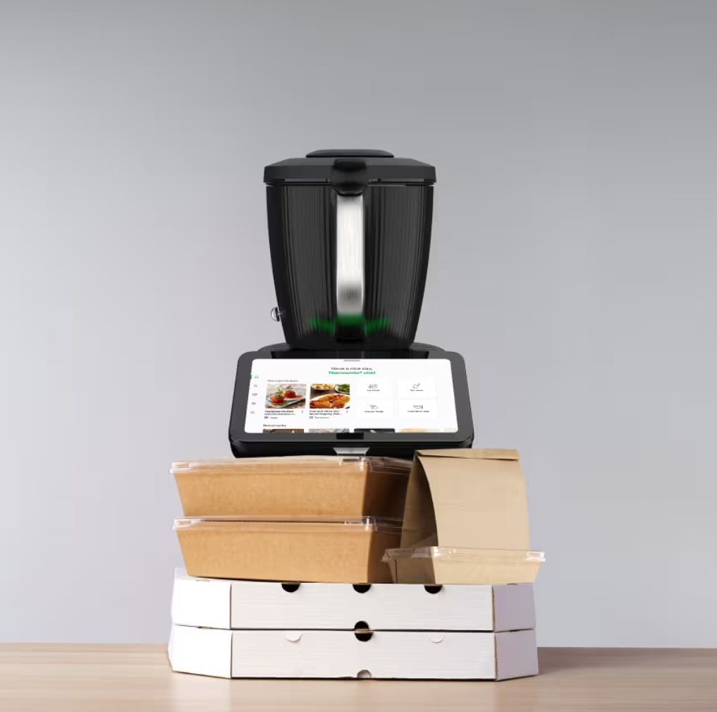 Black Thermomix, Tablet and Stacked Cardboard Boxes — Clare Quintieri Thermomix Consultant in Mareeba, QLD