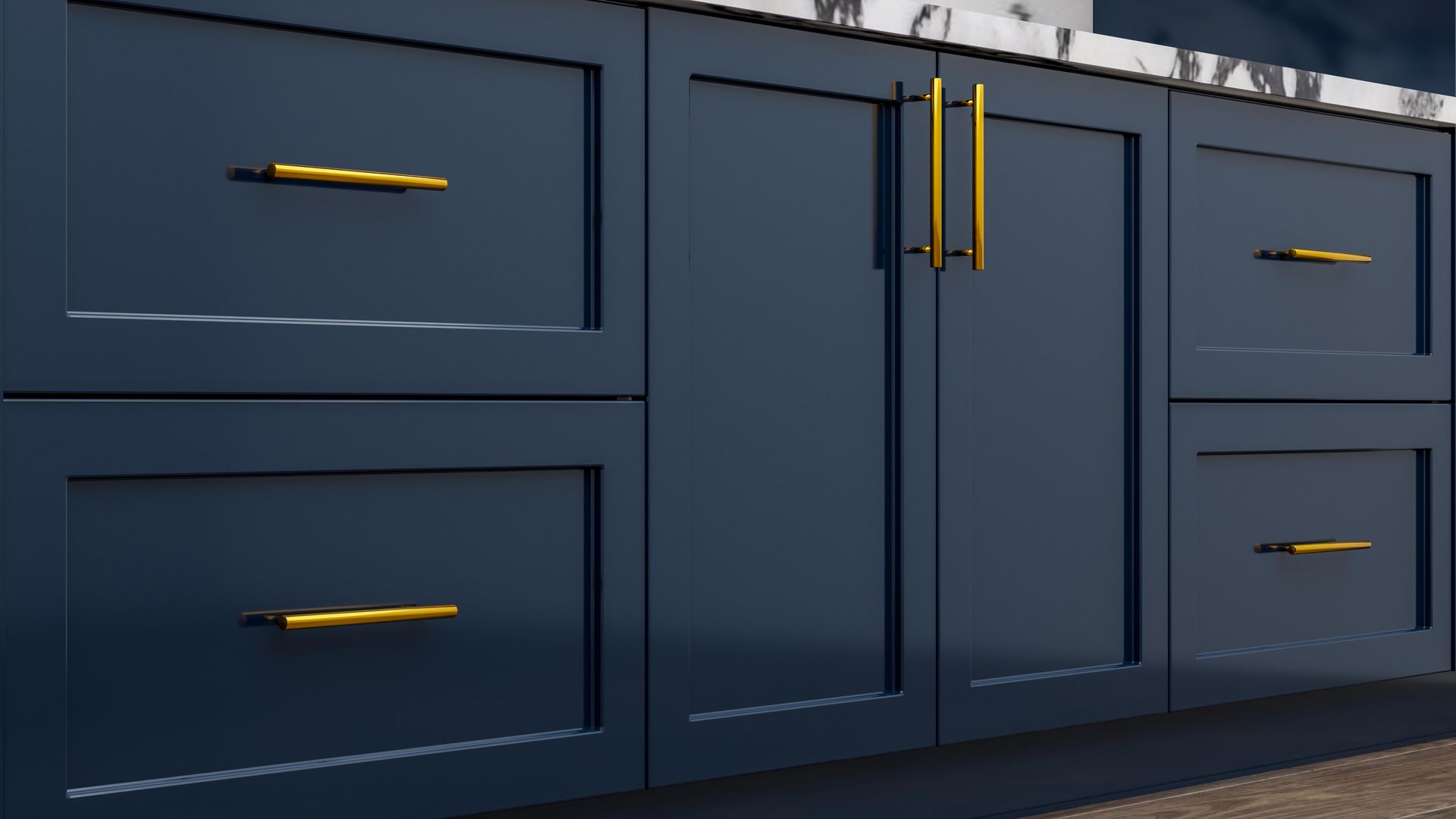 Dark blue kitchen cabinets with gold handles and drawers in a modern interior