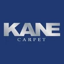 KANE CARPET logo in silver text on a blue background