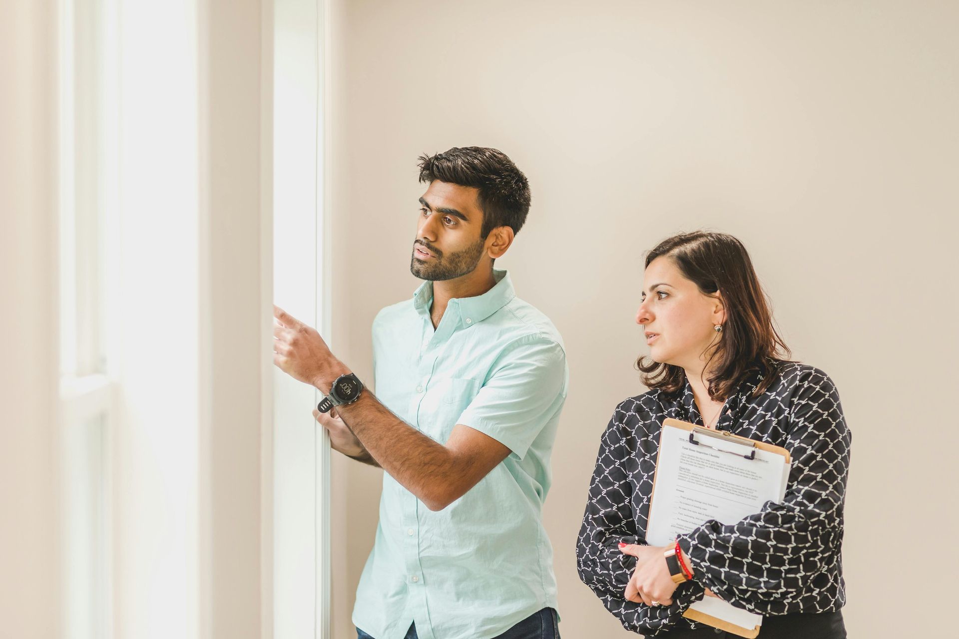 A home inspection professional assesing a new home