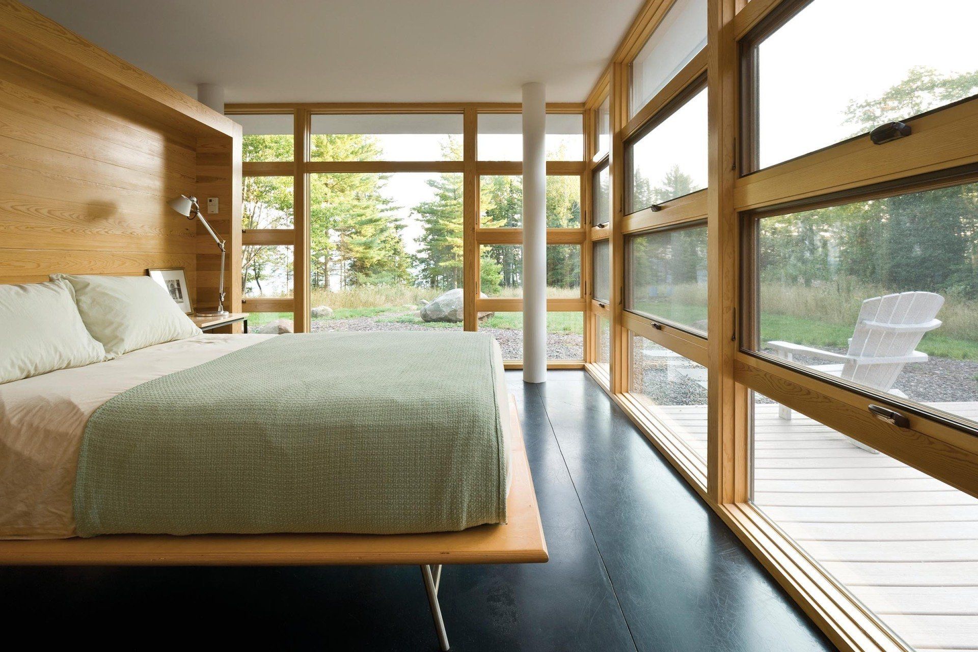 Wall of windows in a bedroom