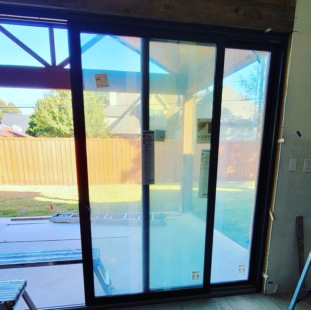 Preview Construction installing a Multi slide big door  in Texas.