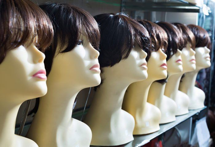 Dolls With Short Hair Extension — Miami, FL & Sunrise, FL — Elite Designer Wigs & Hair Extensions
