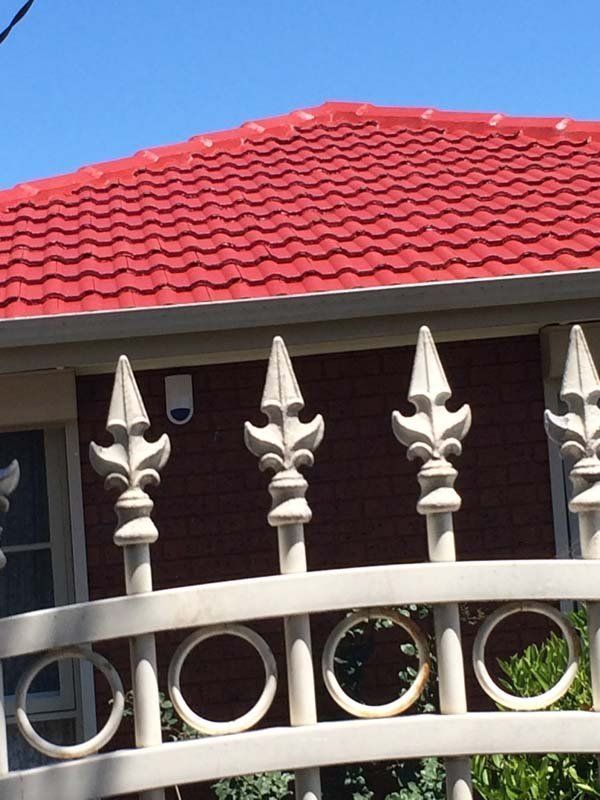 House with Fence — Somerville, VIC — Watkins Roofing