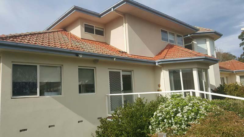 House with Fence and Bu