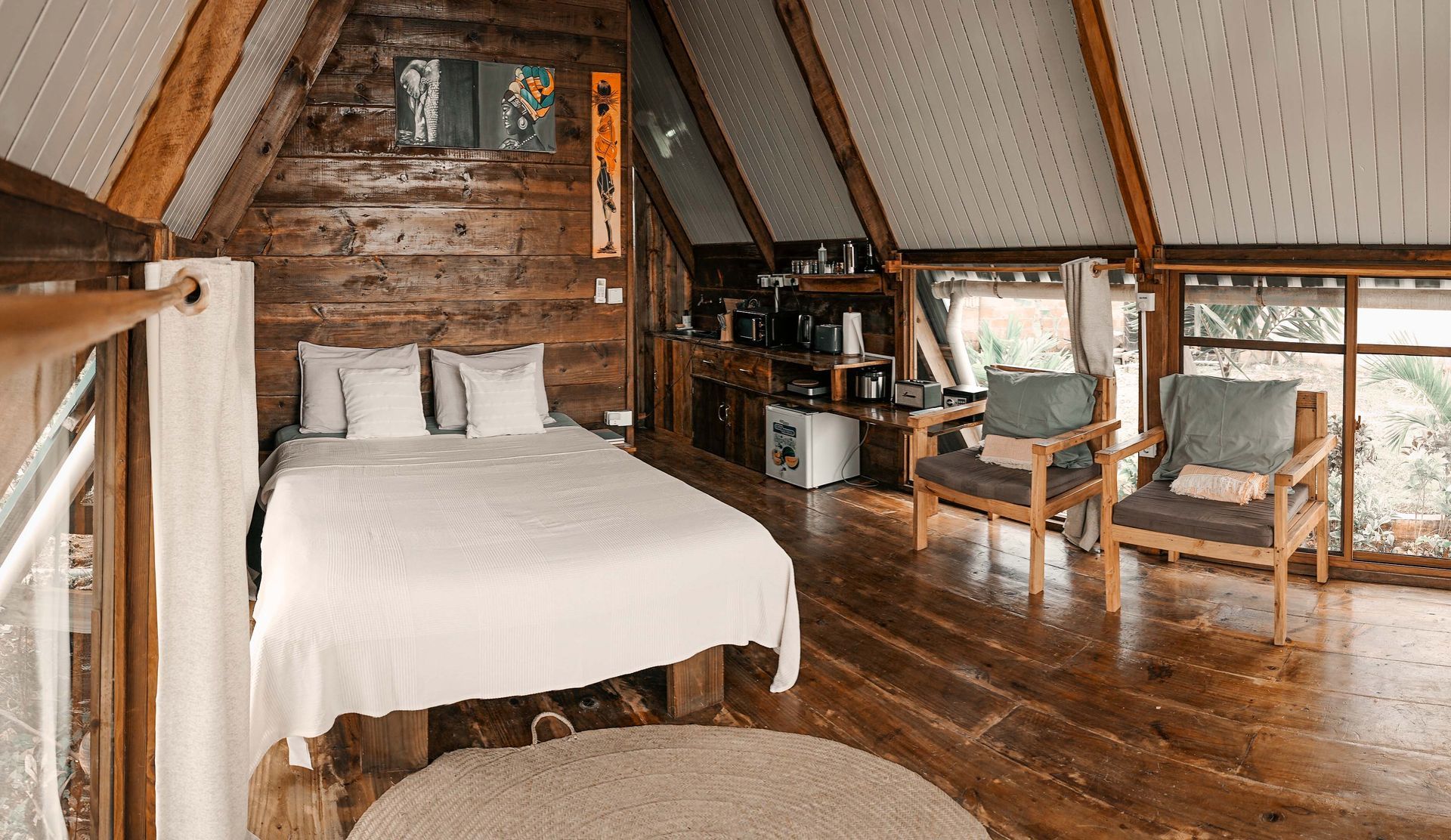 Interior view of the small cabin - bed and kitchenette