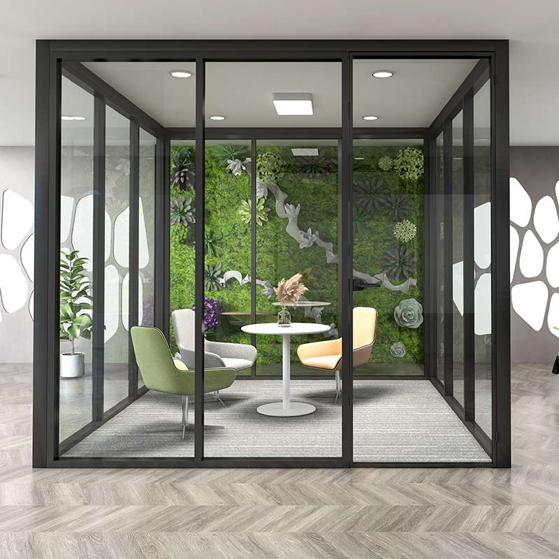 Patterned and frosted glass office partition providing visual privacy while passing daylight through