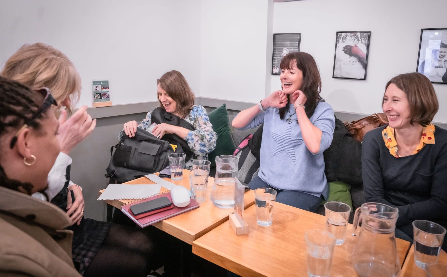 Happy team in a group session
