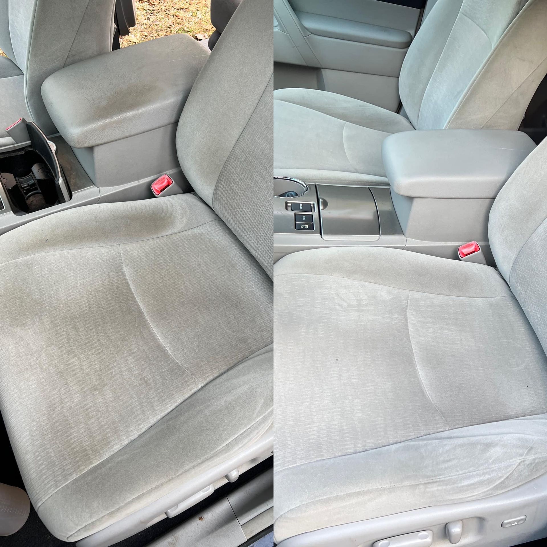 Gray car interior with cloth front seats and center console controls, viewed from the passenger side