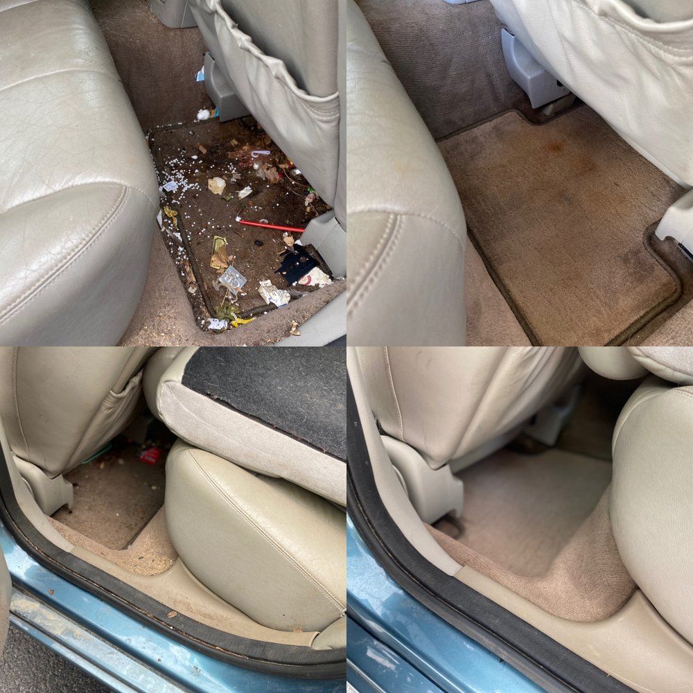Dirty car interior with debris and litter scattered on the floor between beige seats