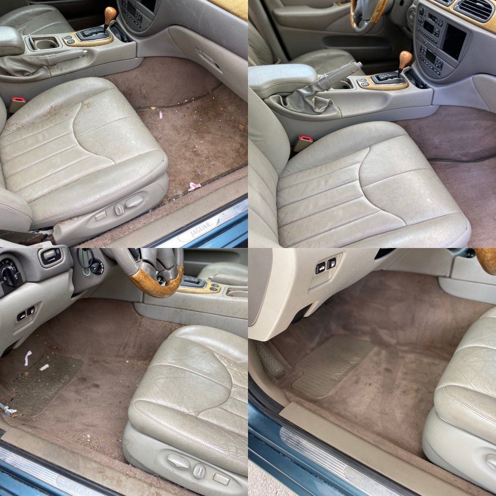 Car interior with beige leather seats folded and removed, showing brown carpet and center console.