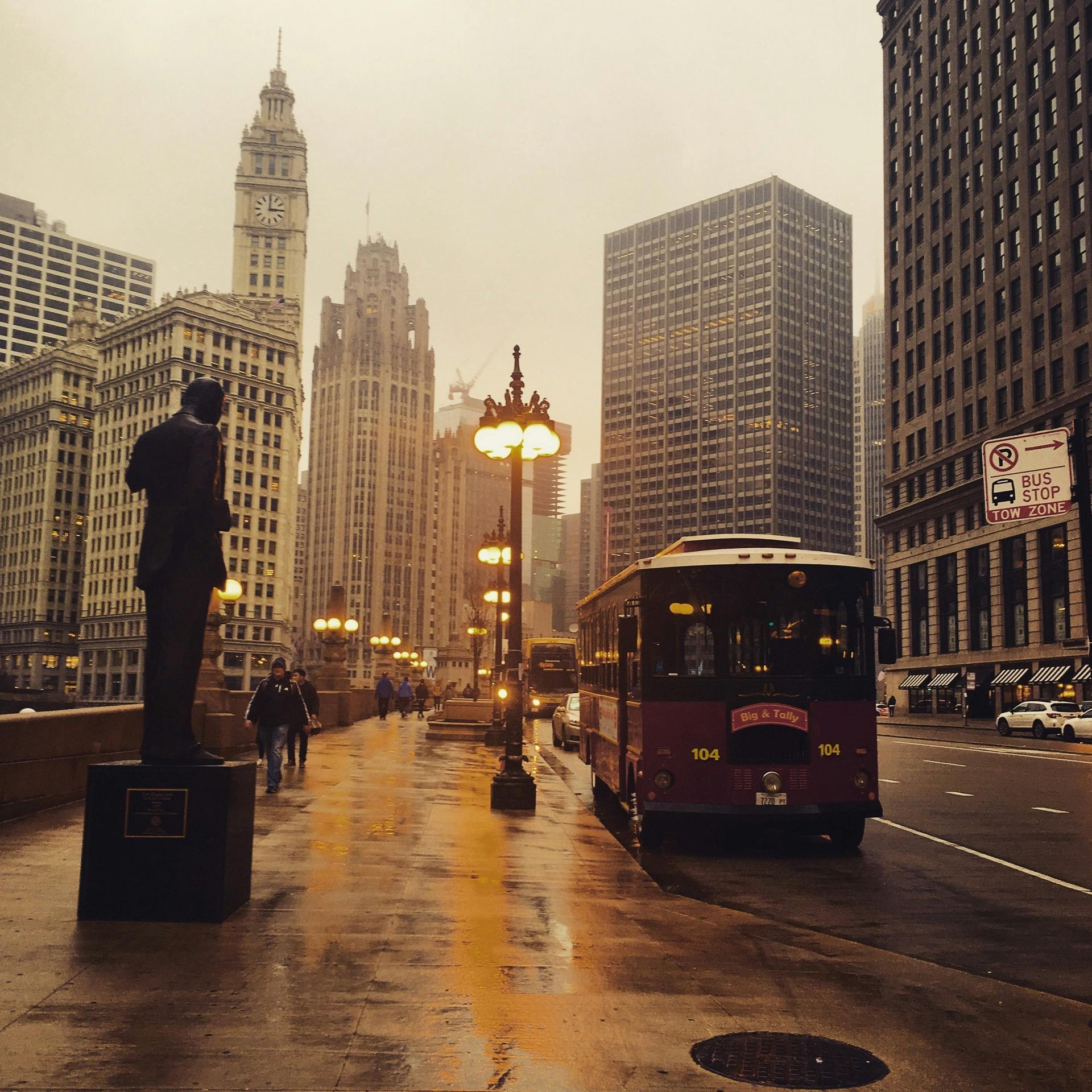 A city street with a bus that says ' chicago ' on the side