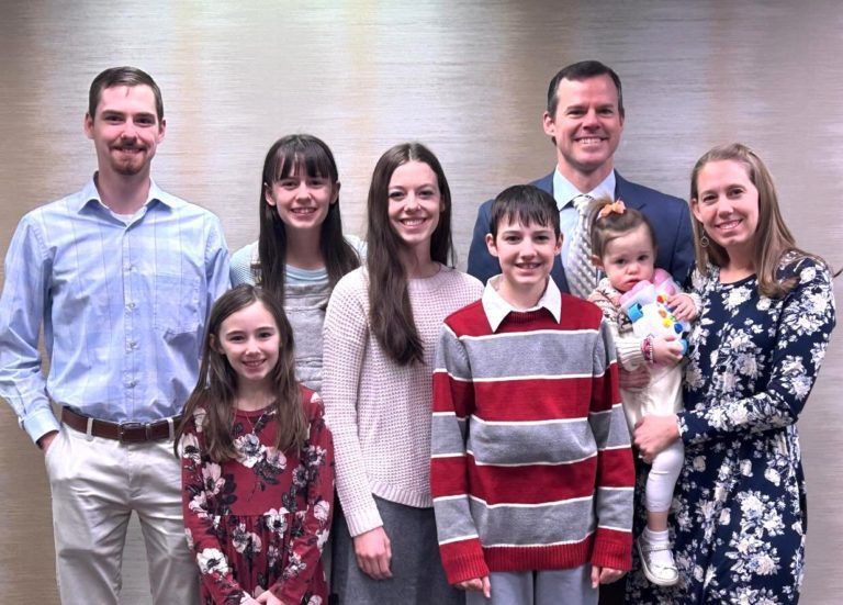 A picture of a family with the words anywhere in the world to die for you
