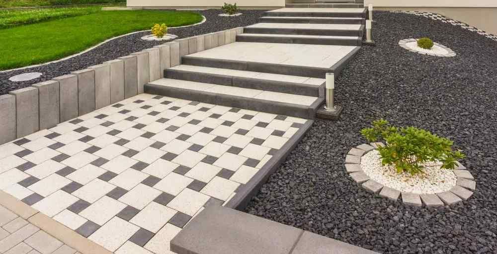 Front garden with external staircase made of prefabricated concrete parts concrete paving — D-Scapes Landscaping Services Pty Ltd in Pacific Palms, NSW