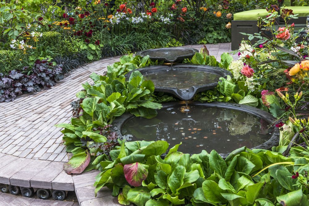 Water feature in a garden — D-Scapes Landscaping Services Pty Ltd in Hallidays Point, NSW