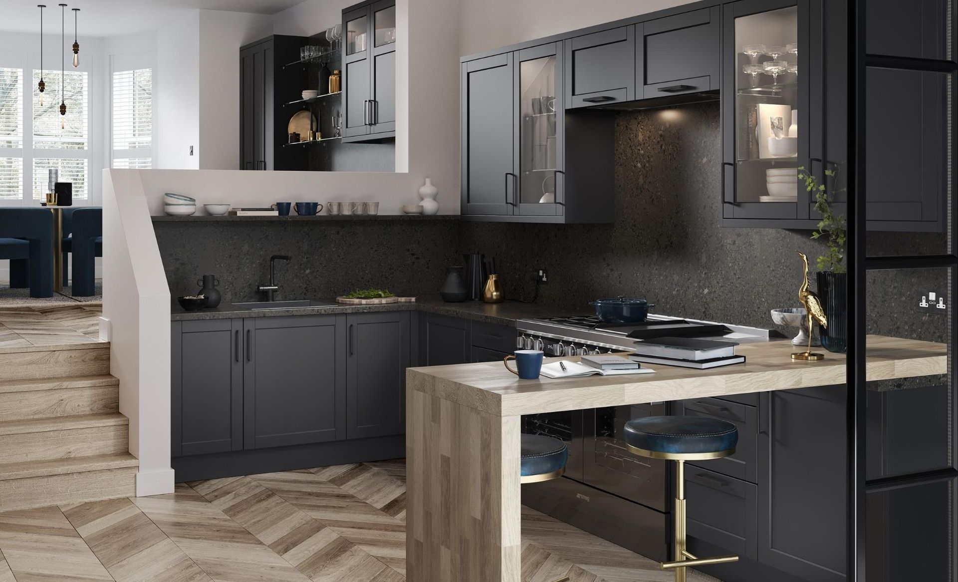 Modern kitchen featuring dark charcoal cabinetry, a light wood breakfast bar, and herringbone flooring.