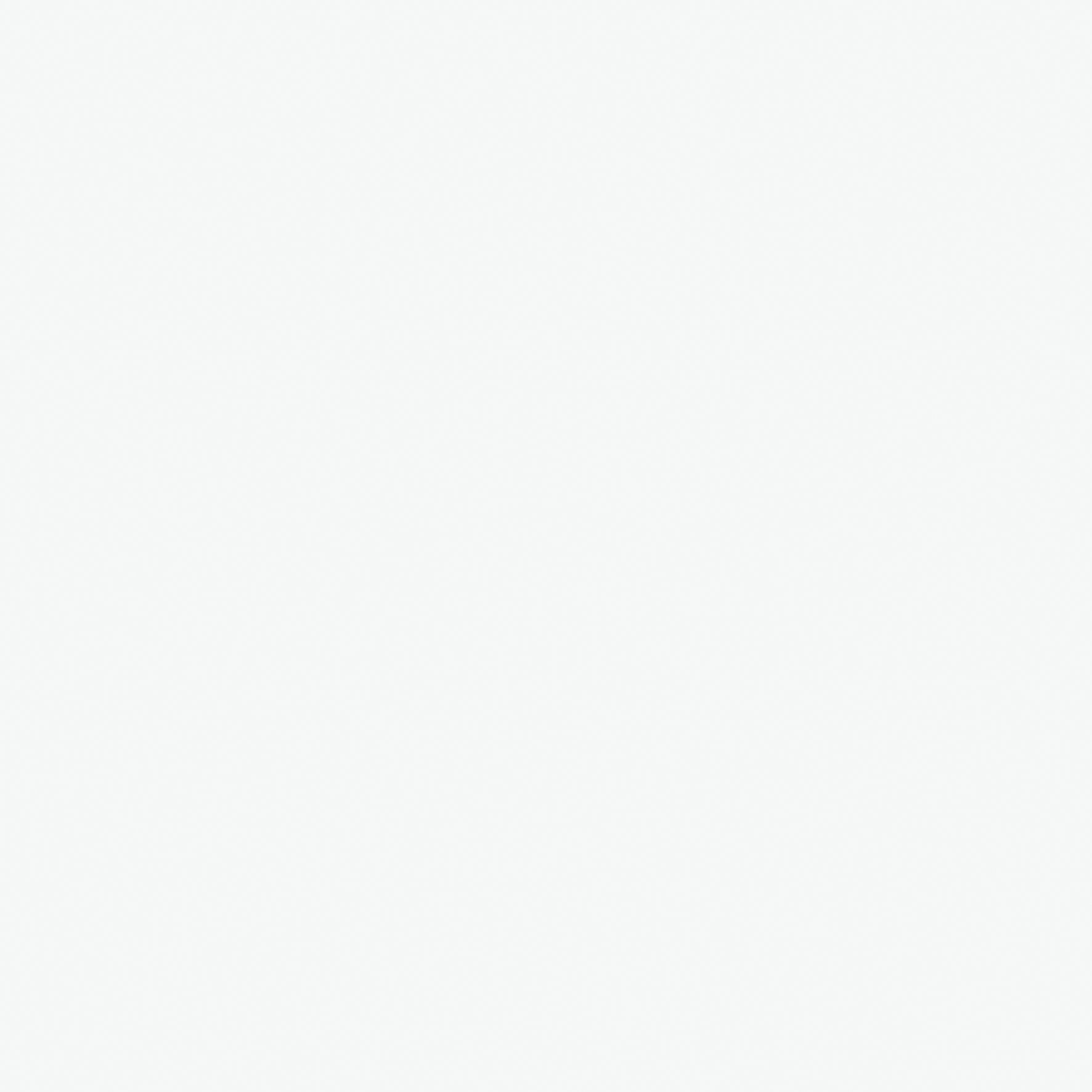 A wide, empty, and bright white room with a smooth, reflective floor.