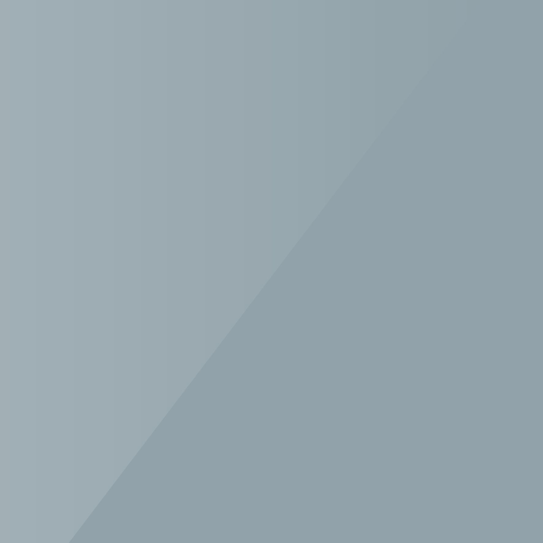A solid, light grey background divided by a diagonal line, creating a subtle contrast between two shades of grey.