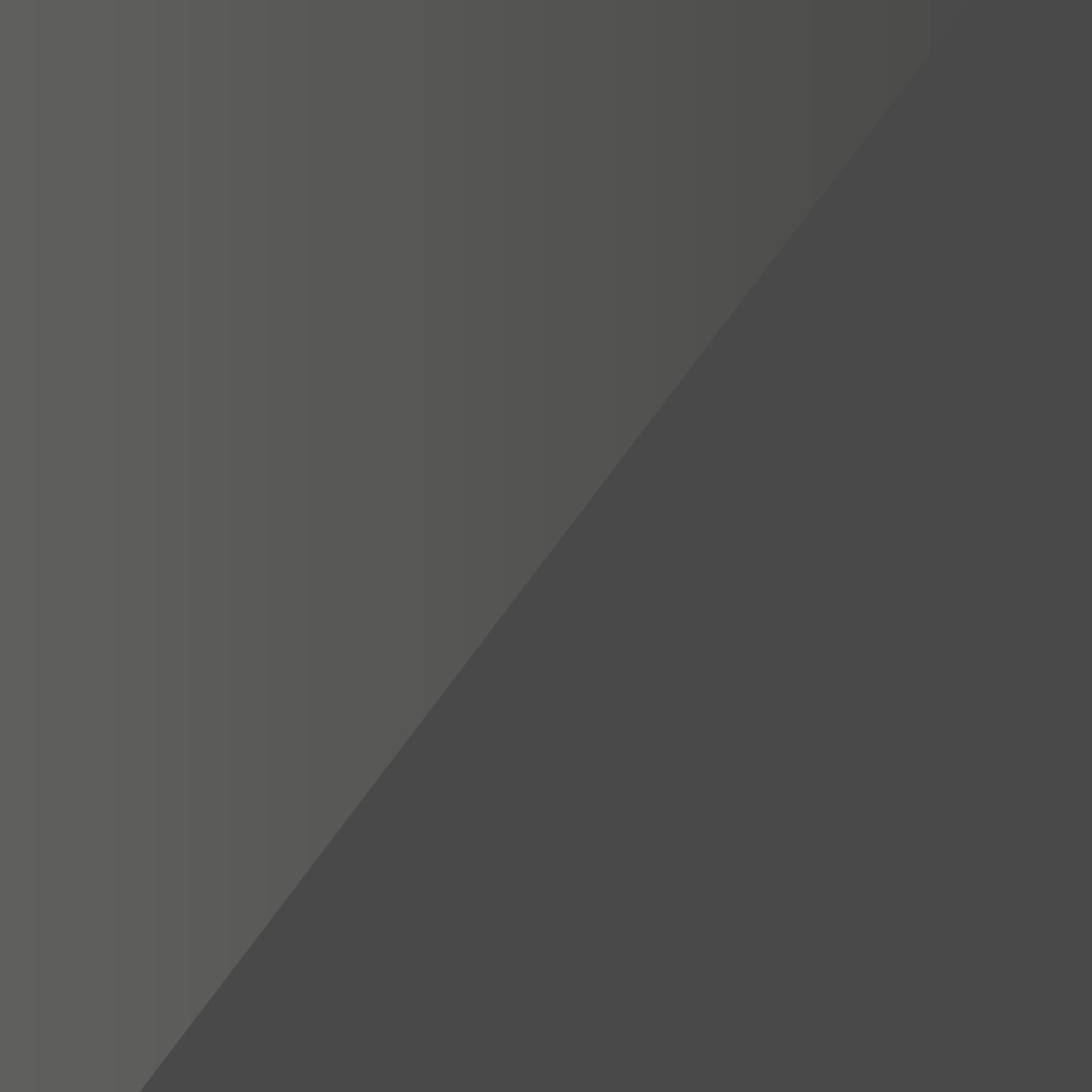 A solid, dark gray background divided diagonally by a subtle, glossy light reflection.