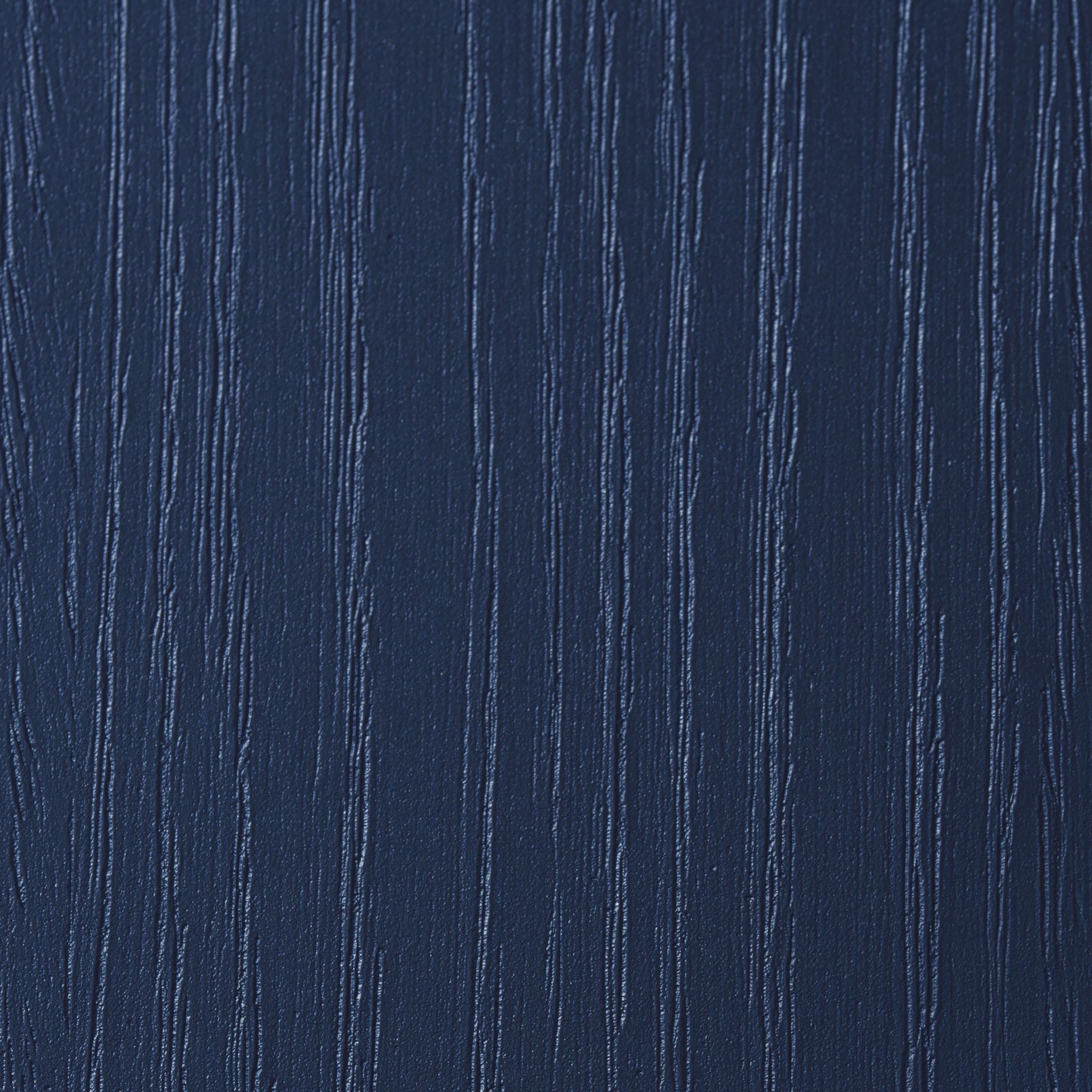Deep blue surface with a vertical, wood-grain texture and subtle, light-reflecting streaks.