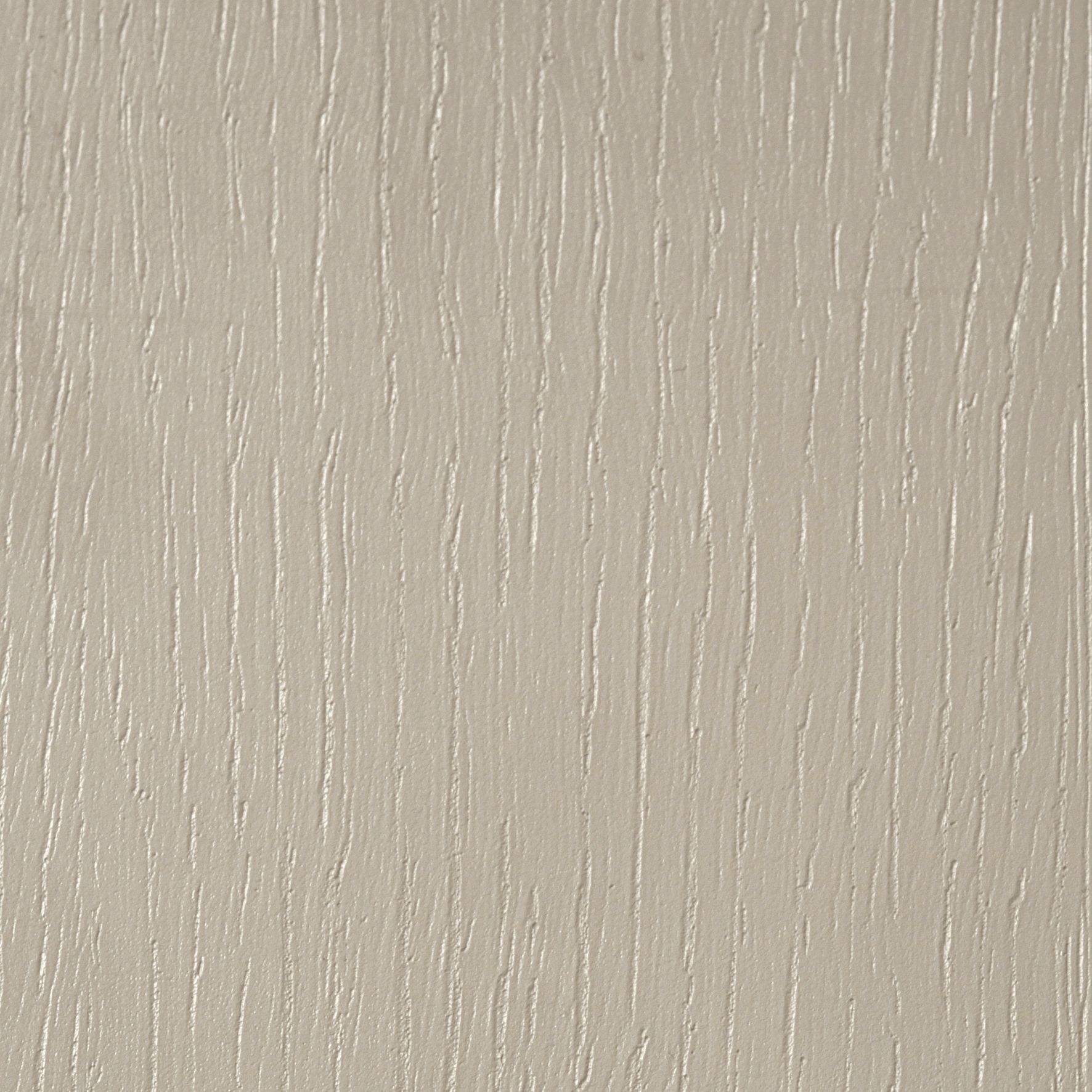 A close-up of a neutral, beige surface with a textured wood grain pattern running vertically.