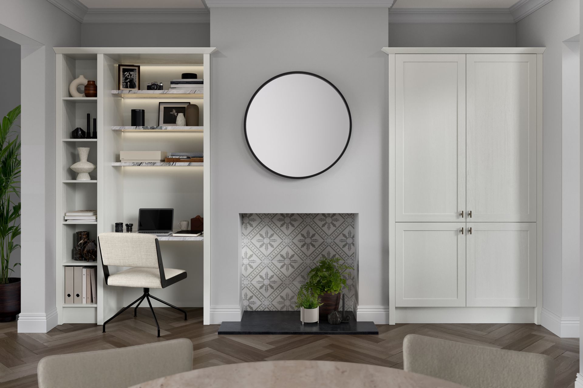 Modern living room with built-in shelves, desk, fireplace, round mirror, and white cabinets