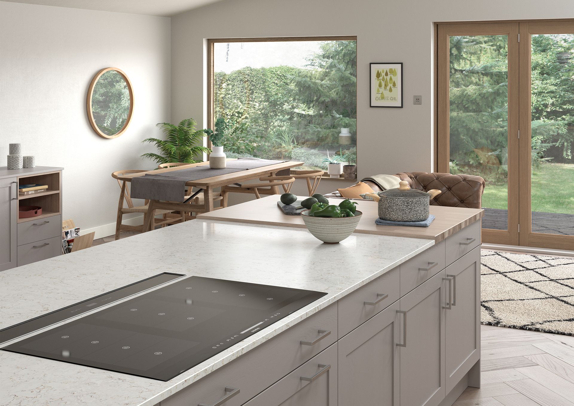 Modern kitchen with white island, dining nook, and backyard view through large windows