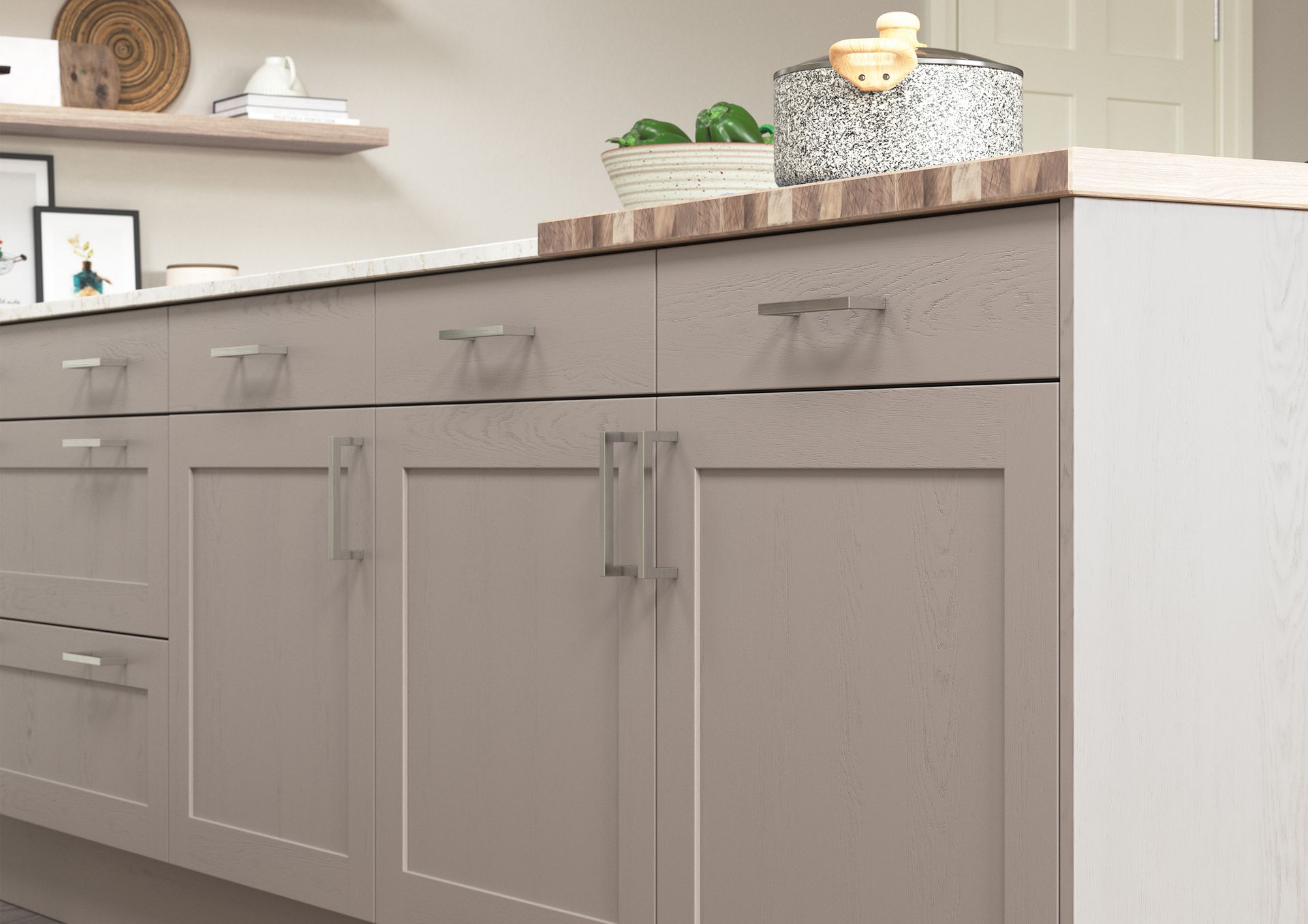 Light gray kitchen cabinets with wood countertop and decorative items on a shelf