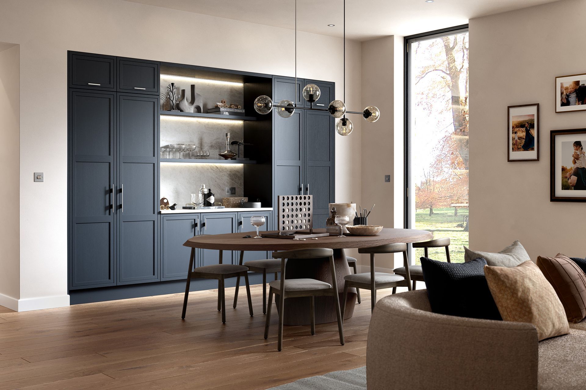 A dining area with a modern dark blue paneled cabinet, a wooden table, chairs, and a contemporary chandelier.