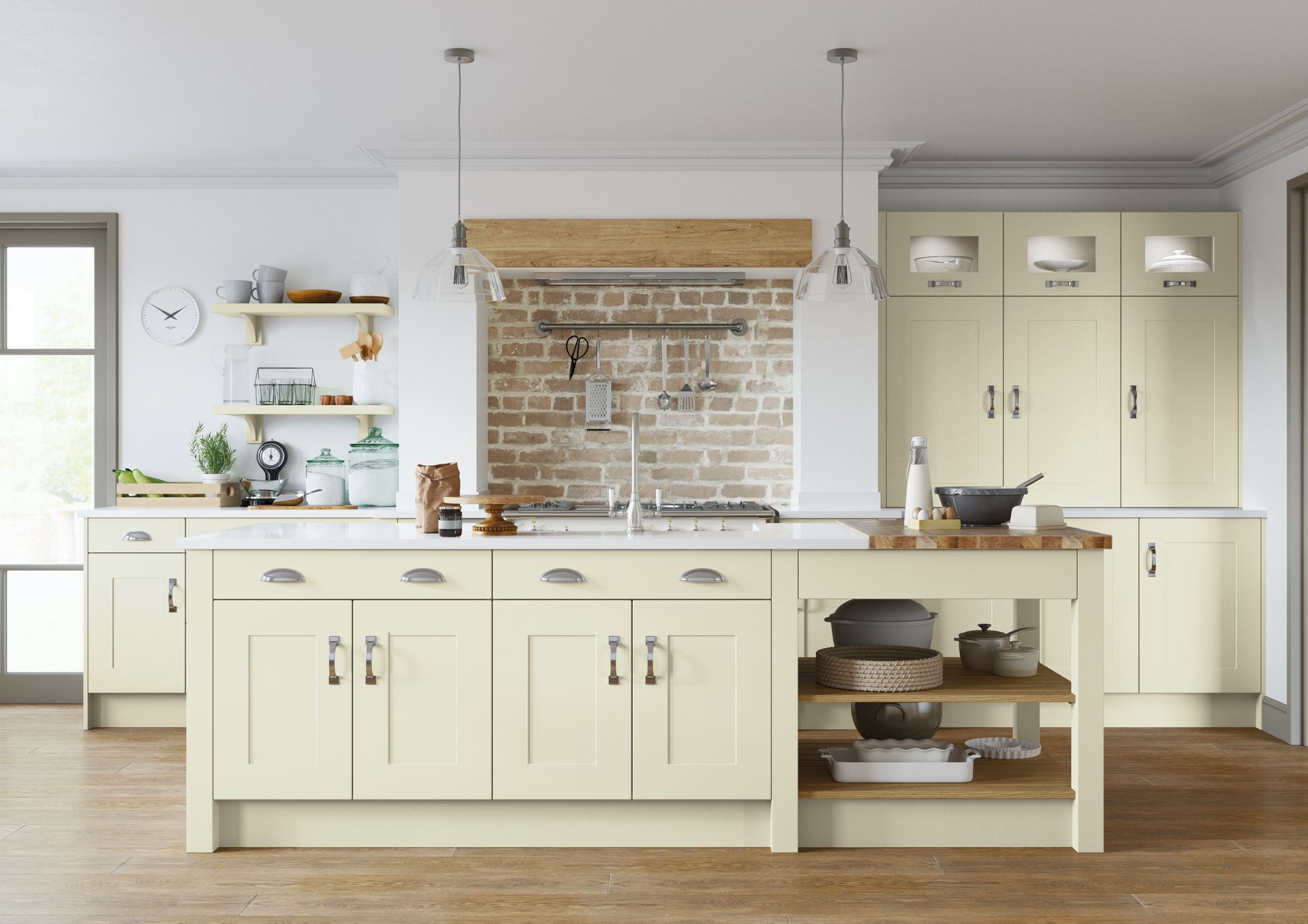 A bright, modern kitchen featuring cream-colored cabinets, a central island, an exposed brick wall, and open shelving.