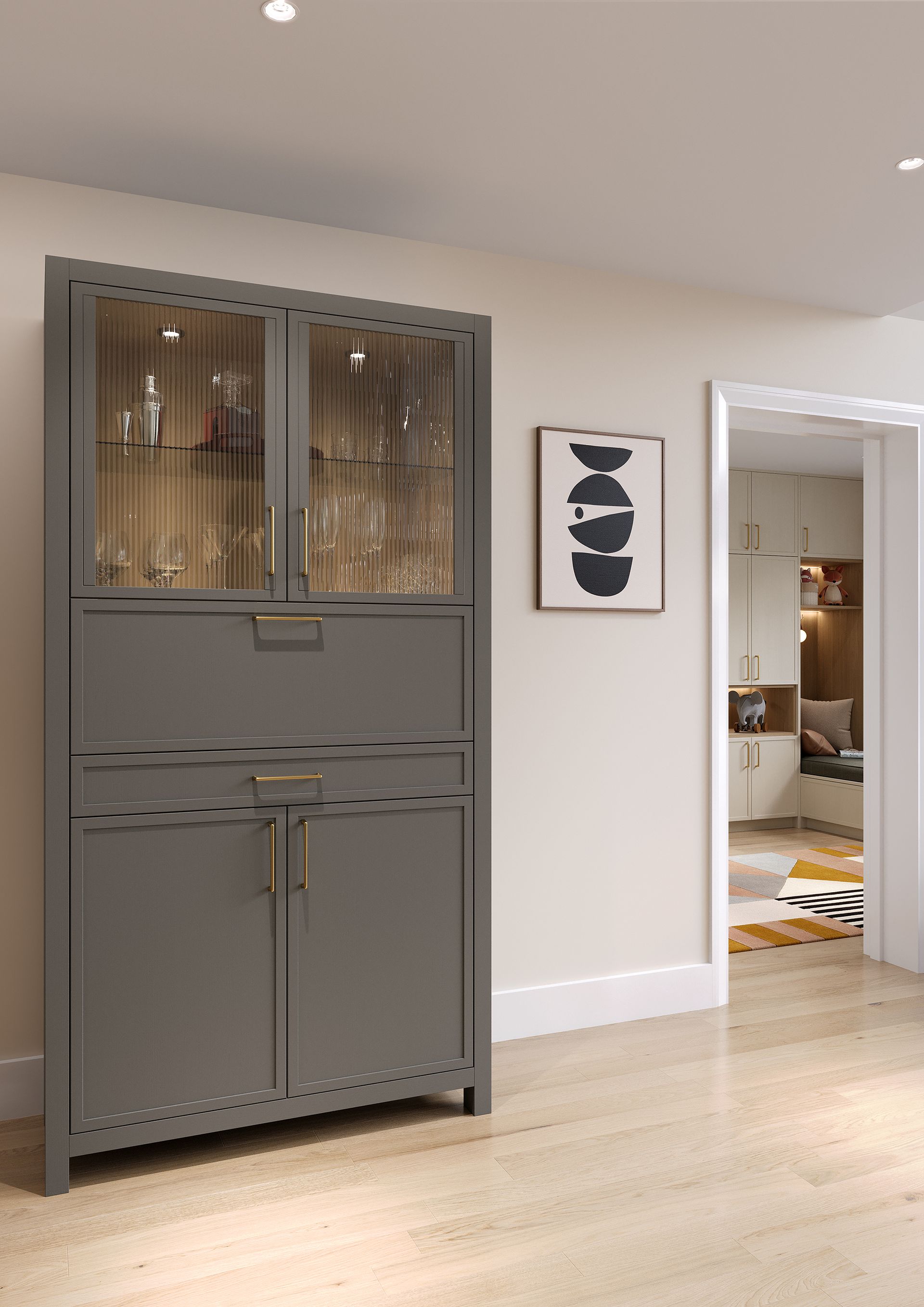 A tall, charcoal-grey cabinet with glass upper doors and solid lower doors stands in a light-filled, minimalist room.