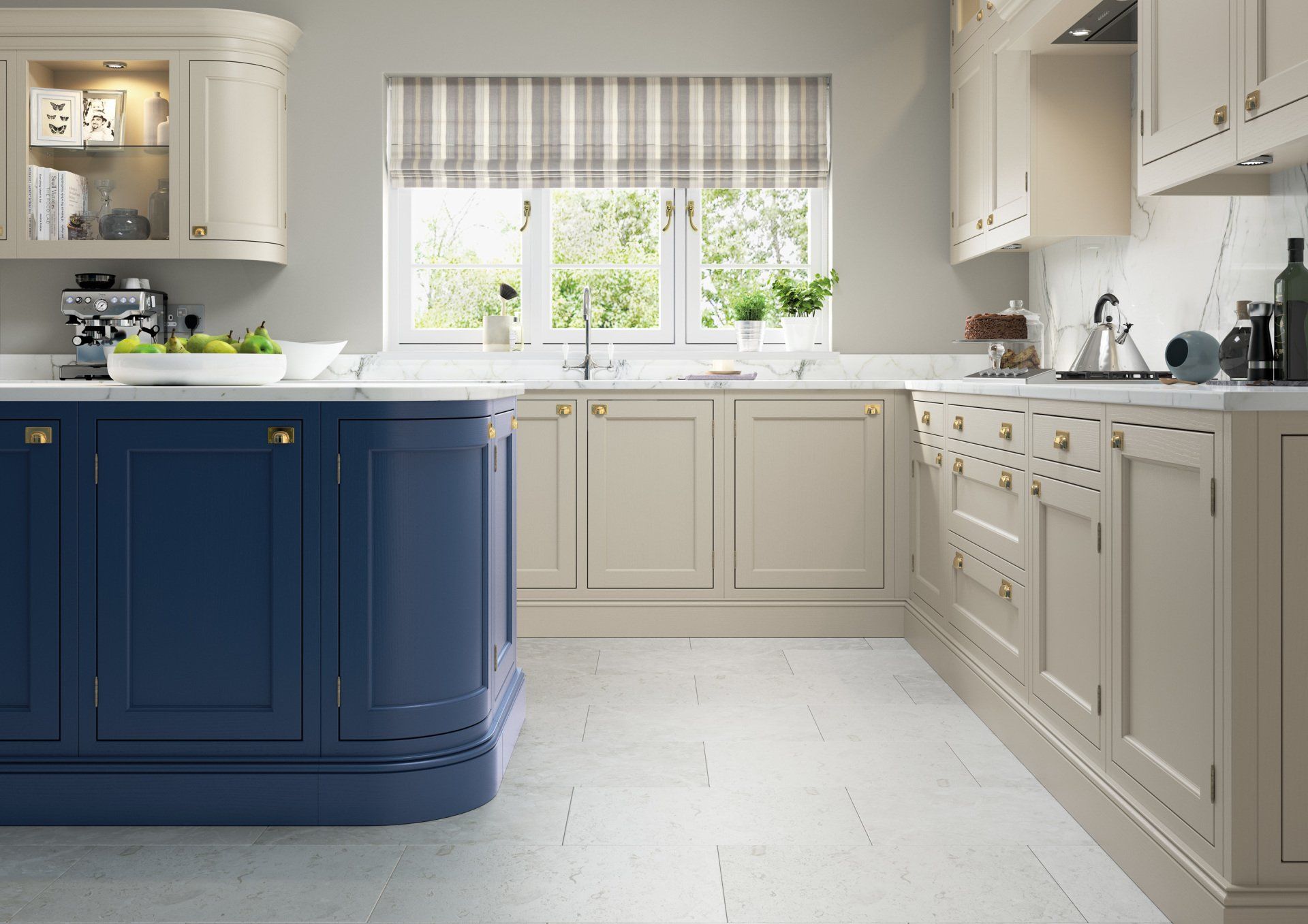 A modern kitchen featuring a dark blue island, light grey cabinets, and stone tile flooring under a window with blinds.