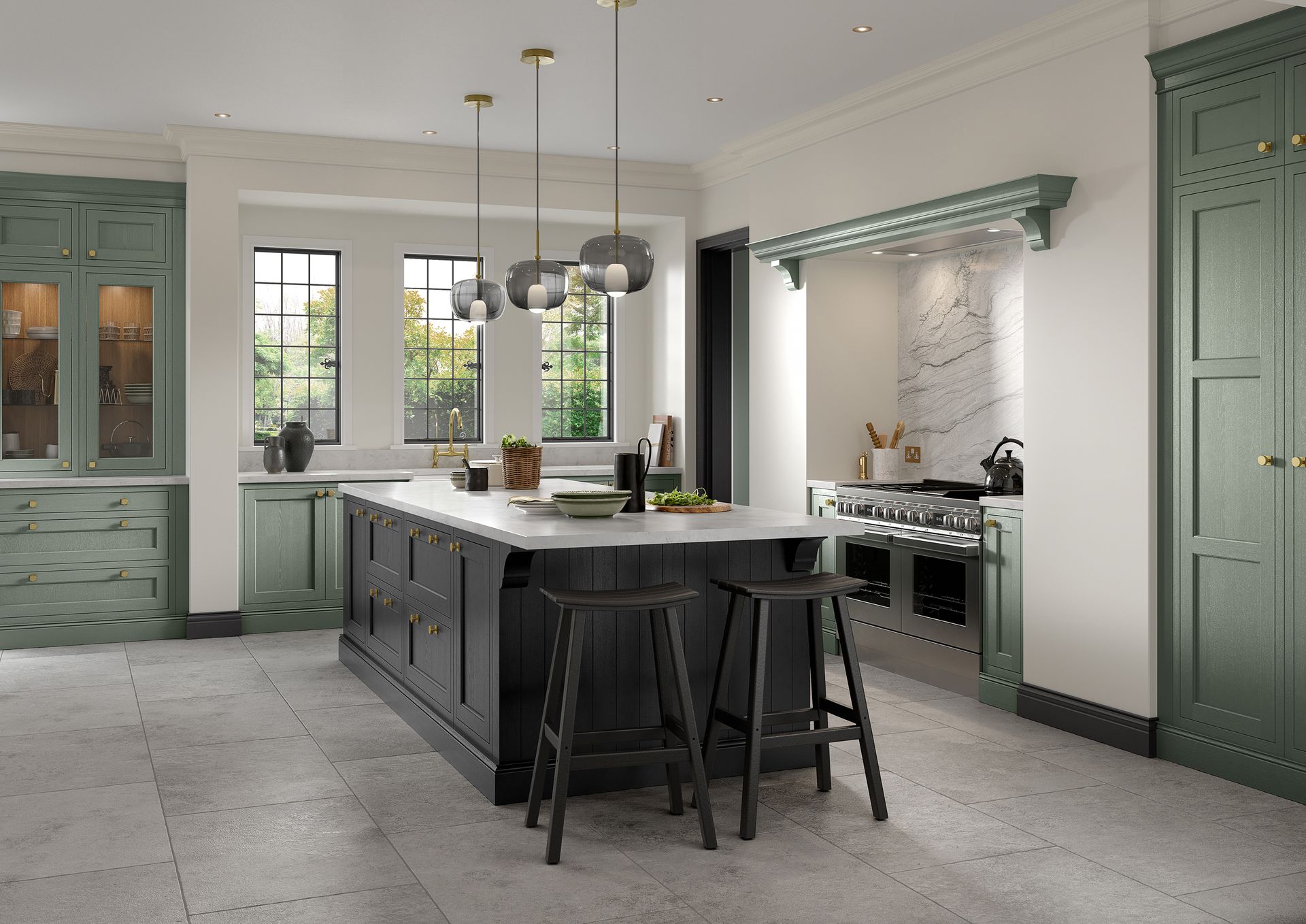 A modern kitchen featuring a dark green island, white countertops, black bar stools, and matching sage green cabinets.