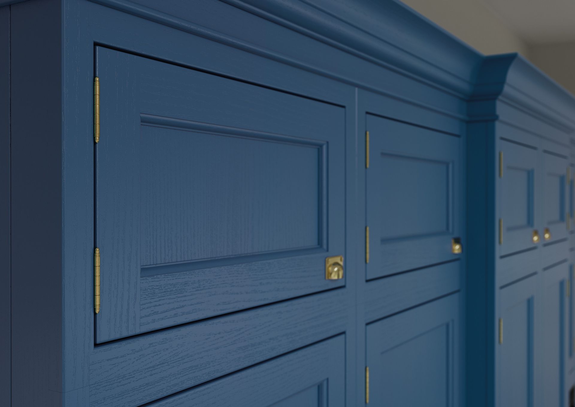 A close-up of blue, wood-grained cabinet doors with gold hinges and latches, featuring a classic, paneled design.