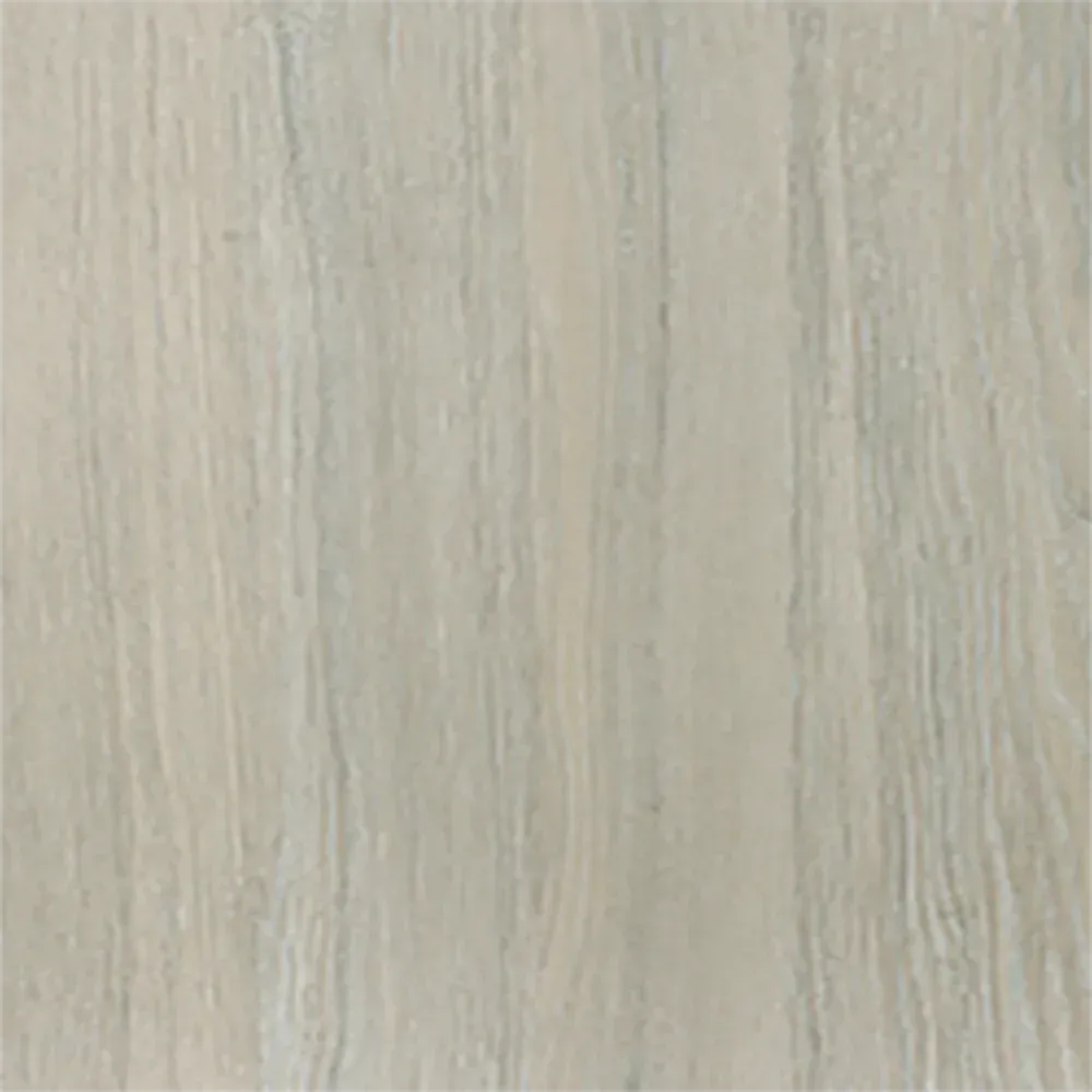 A close-up of a neutral, light-gray stone or ceramic tile surface with vertical, wood-grain-like texture and streaks.