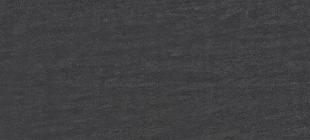 A dark gray, slate-like texture with fine, horizontal streaks and subtle grain throughout.