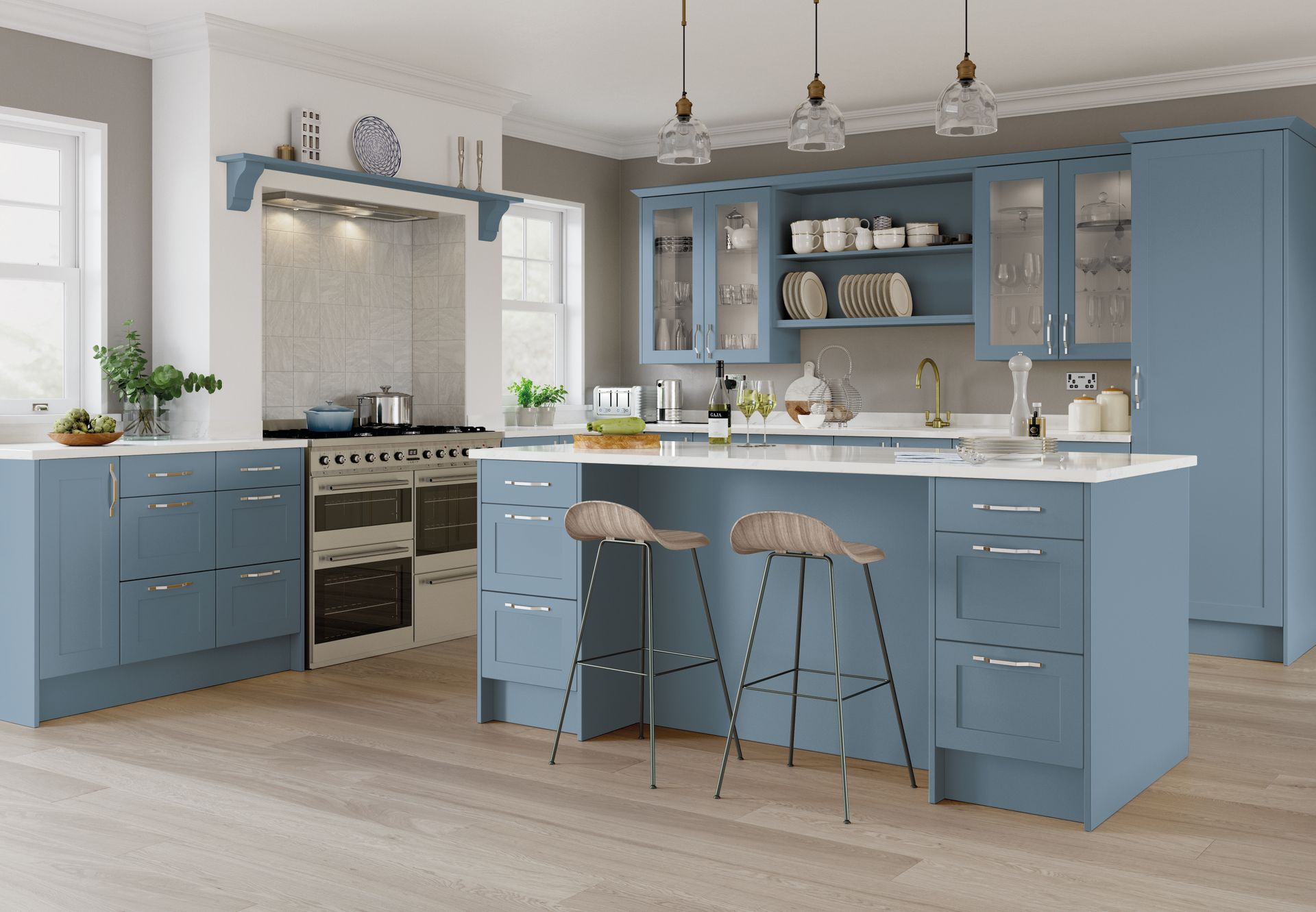 A modern kitchen featuring blue Shaker-style cabinets, a central island with two bar stools, and light wood flooring.