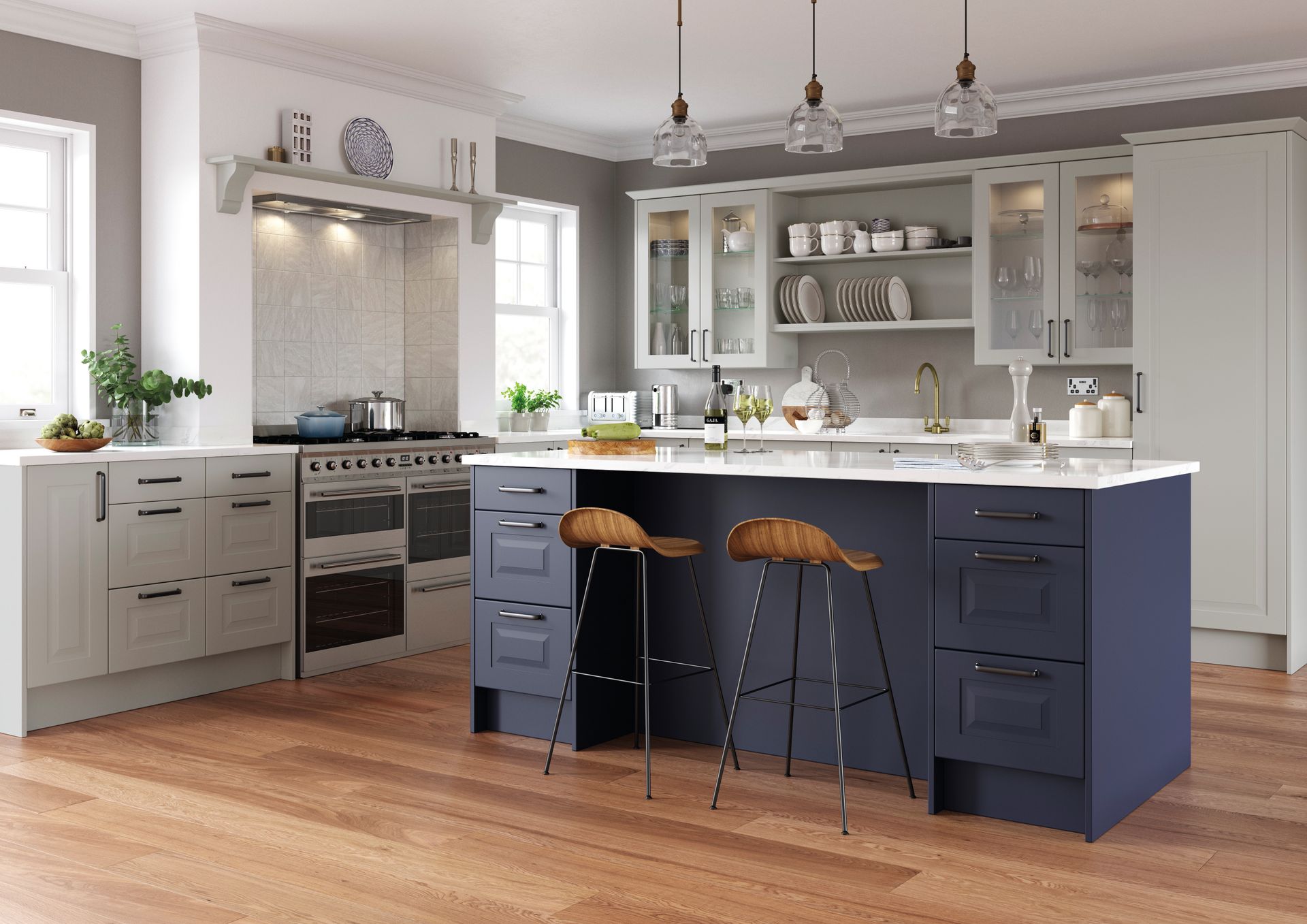 A modern kitchen featuring light-gray perimeter cabinets, a navy blue island with bar stools, and hardwood floors.
