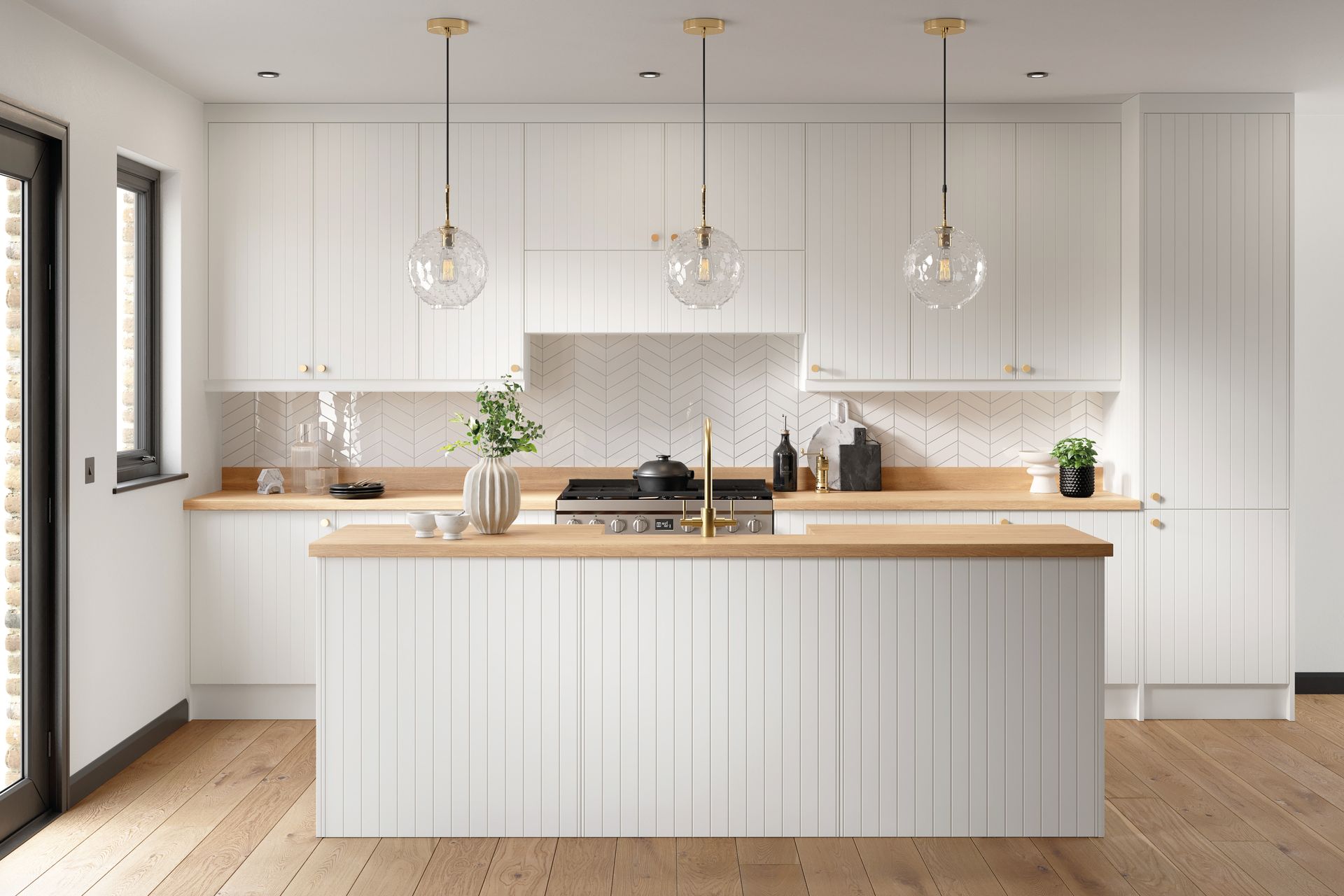 Modern white kitchen with vertical paneling, light wood countertops, three pendant lights, and hardwood flooring.