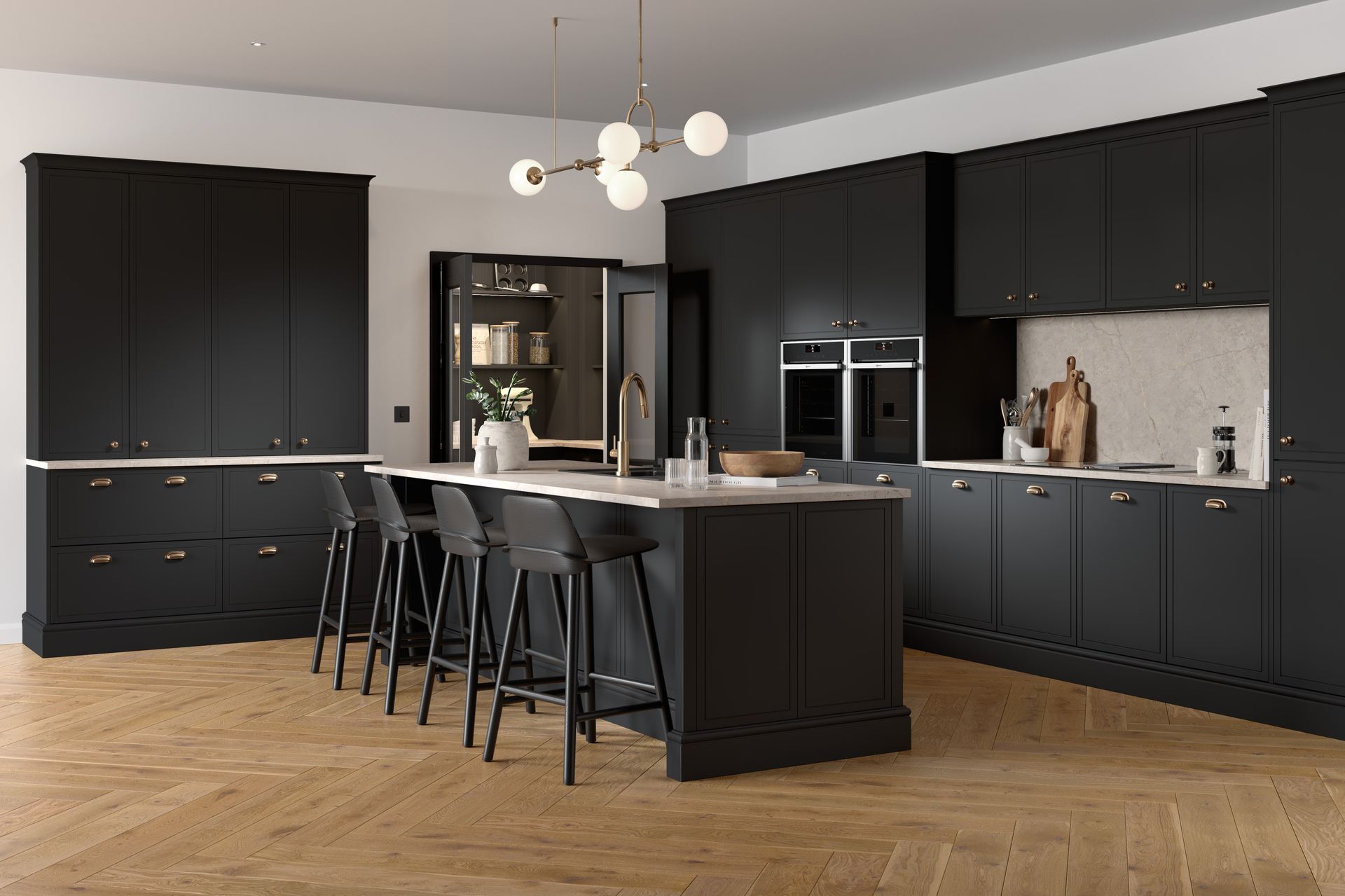 A modern kitchen with matte black cabinetry, a central island with bar stools, and herringbone light wood flooring.