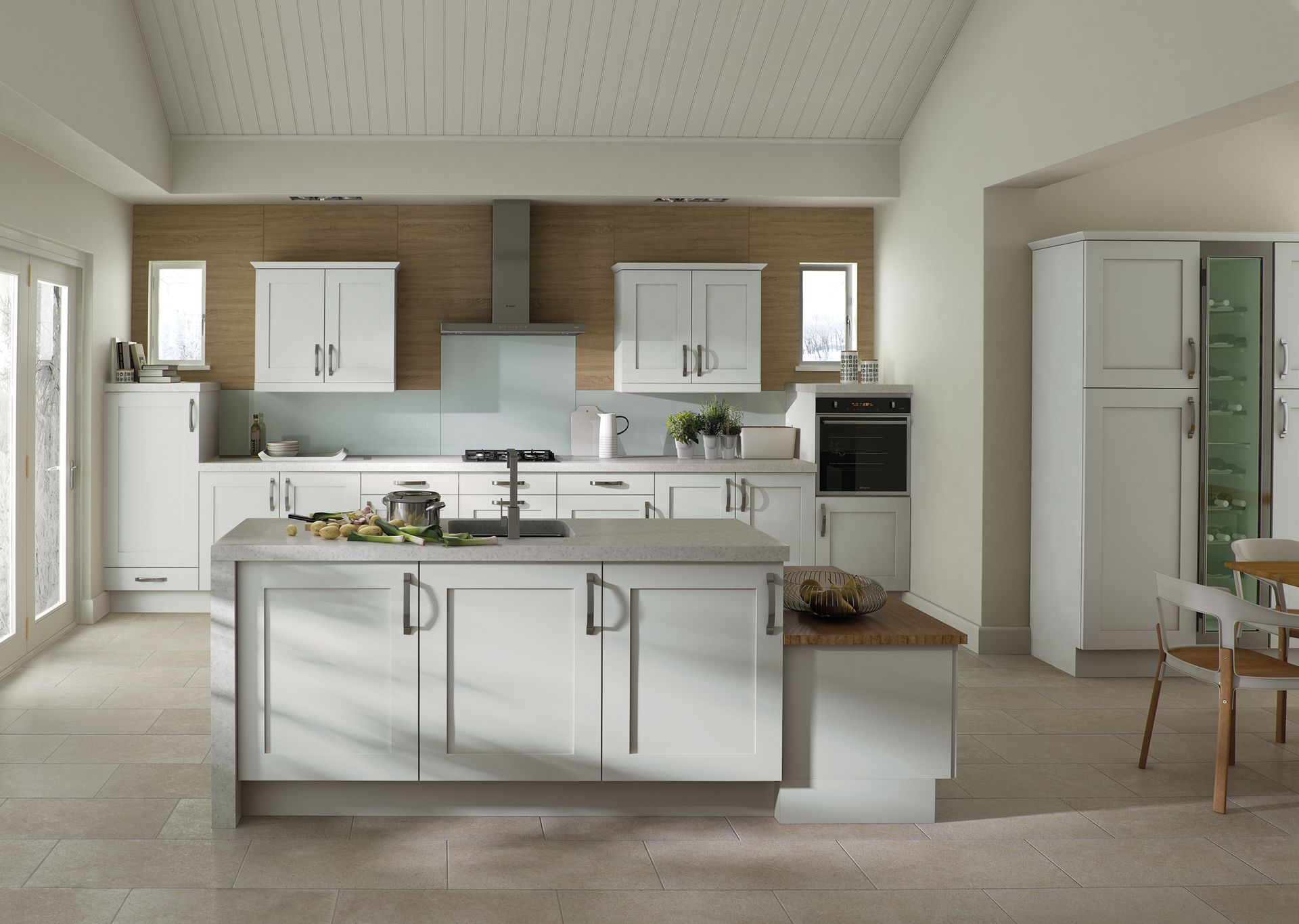 Modern white kitchen with a central island, light wood walls, and sleek stainless steel appliances.