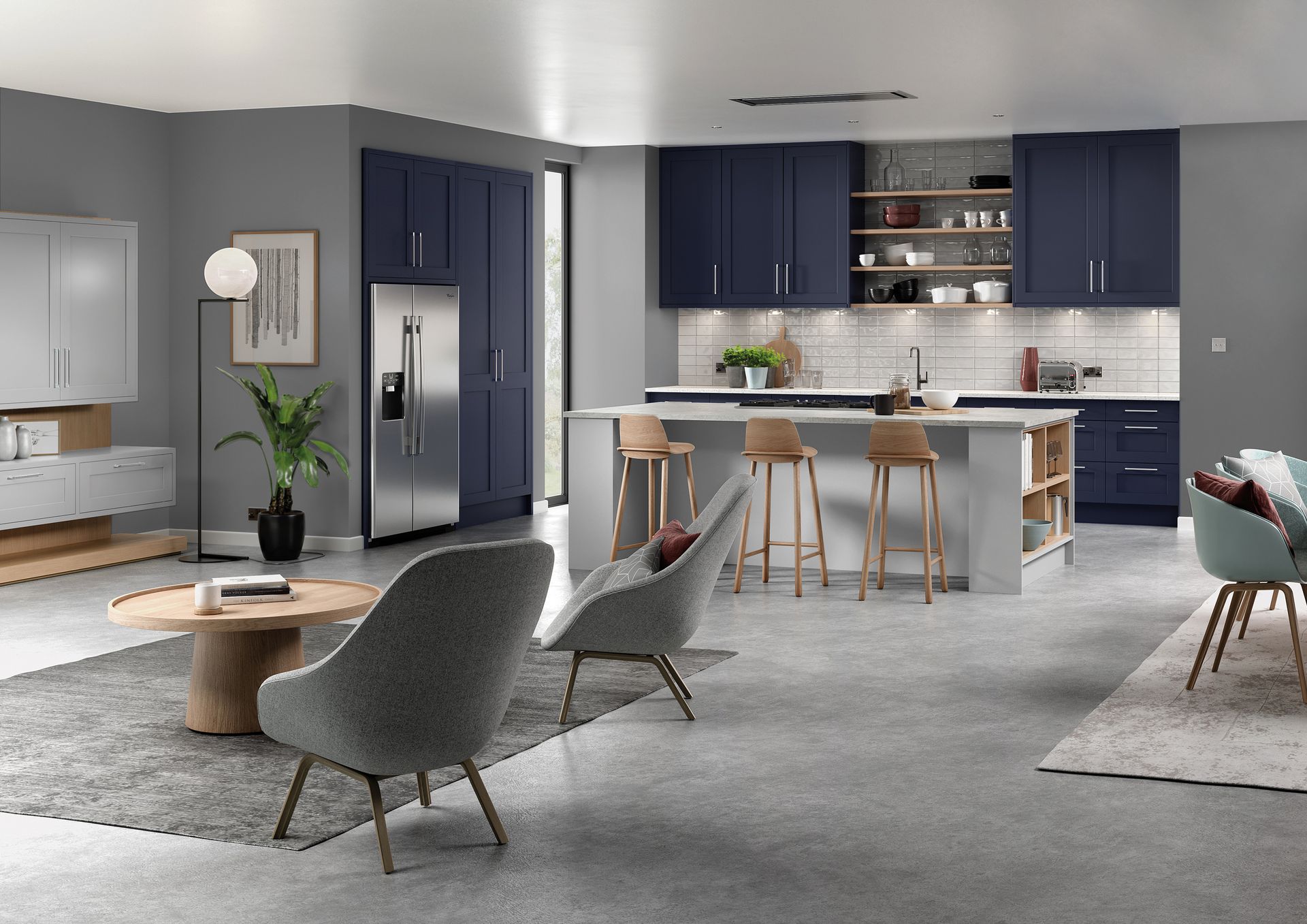 A modern open-plan kitchen and living space featuring dark blue cabinets, a central island, and contemporary furniture.