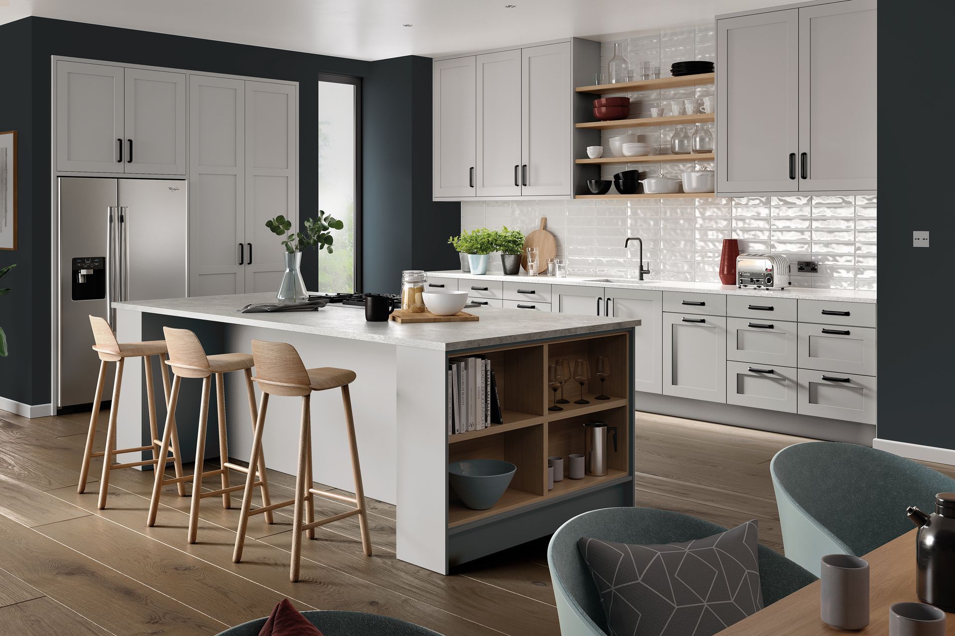 Modern kitchen with light gray cabinets, a white island with wooden shelving, bar stools, and dark gray accent walls.
