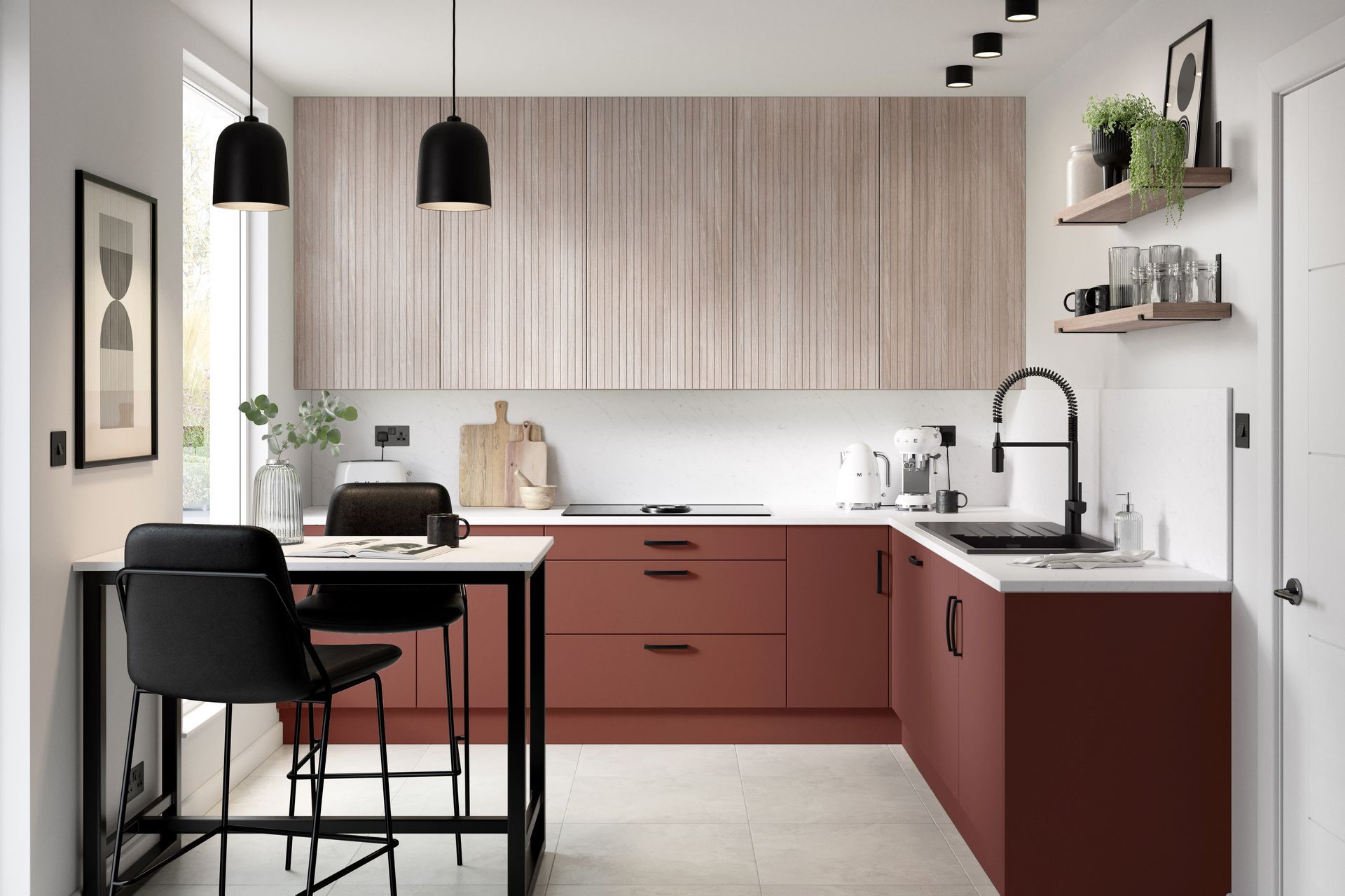 Modern kitchen with red base cabinets, wood-grain upper cabinets, a small dining table, and black pendant lighting.