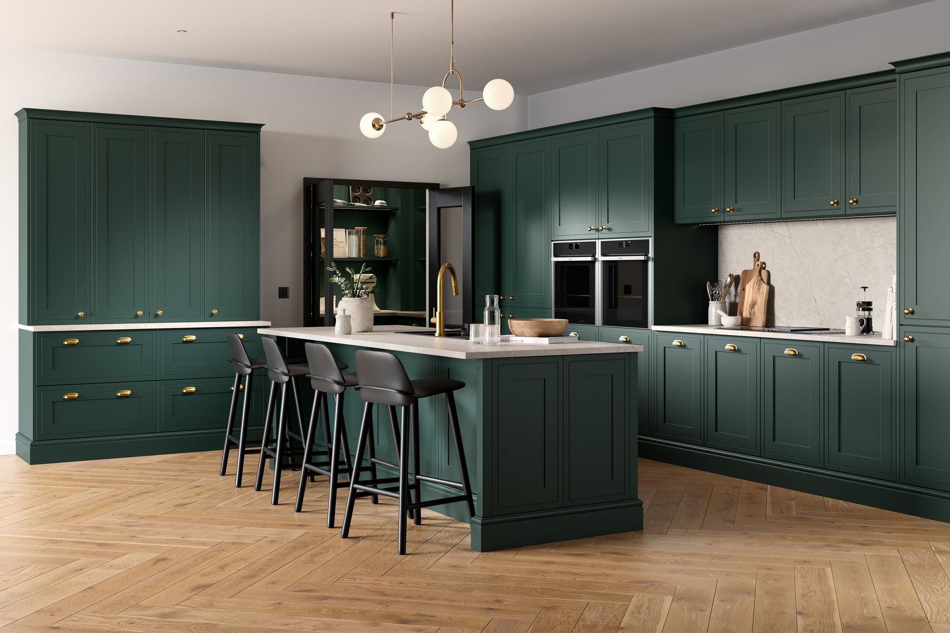 A modern kitchen with deep green shaker-style cabinets, a central island with bar stools, and a light-wood herringbone floor.
