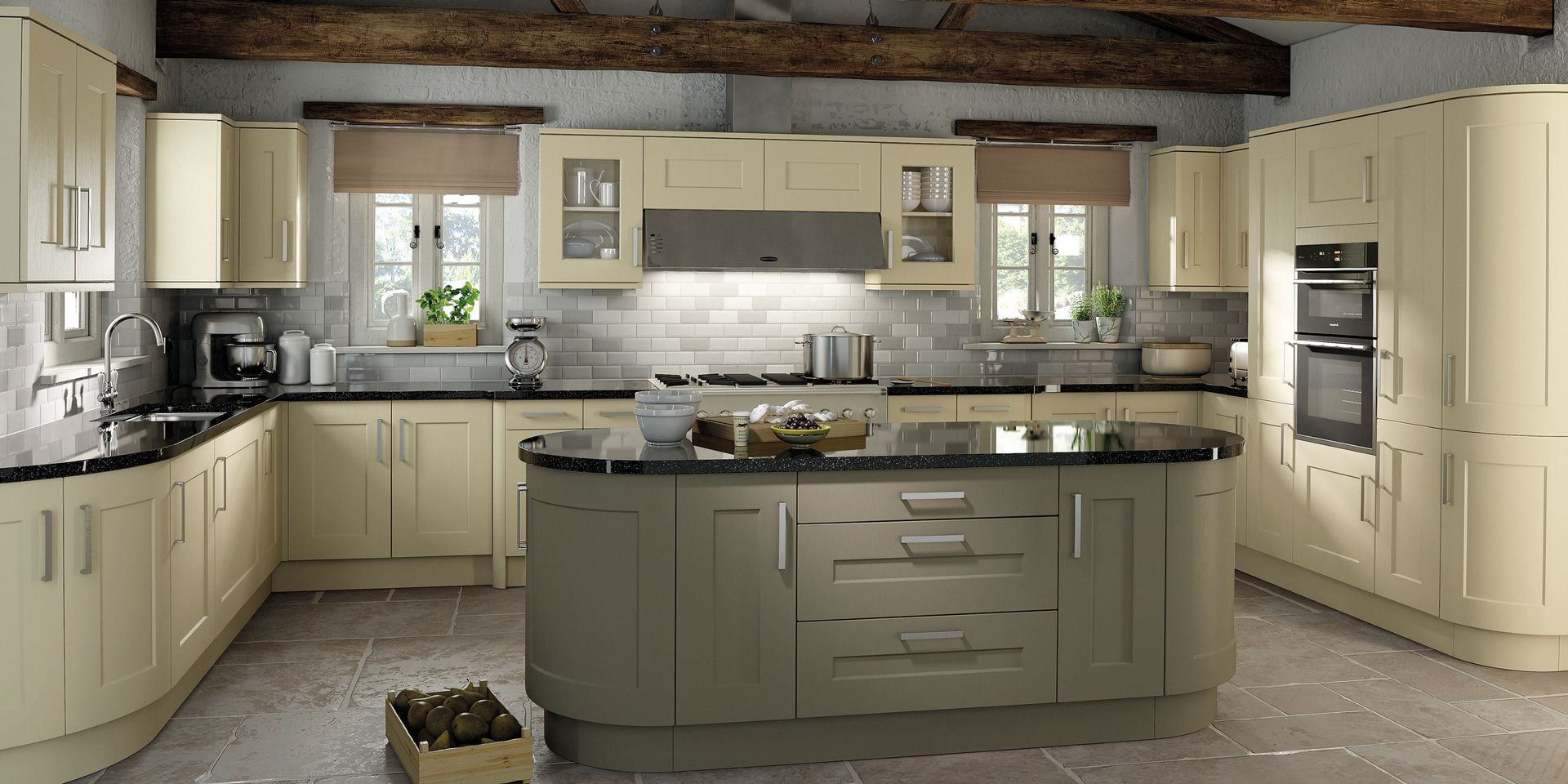 Cream-colored kitchen cabinets with a grey central island, black countertops, and wooden ceiling beams.